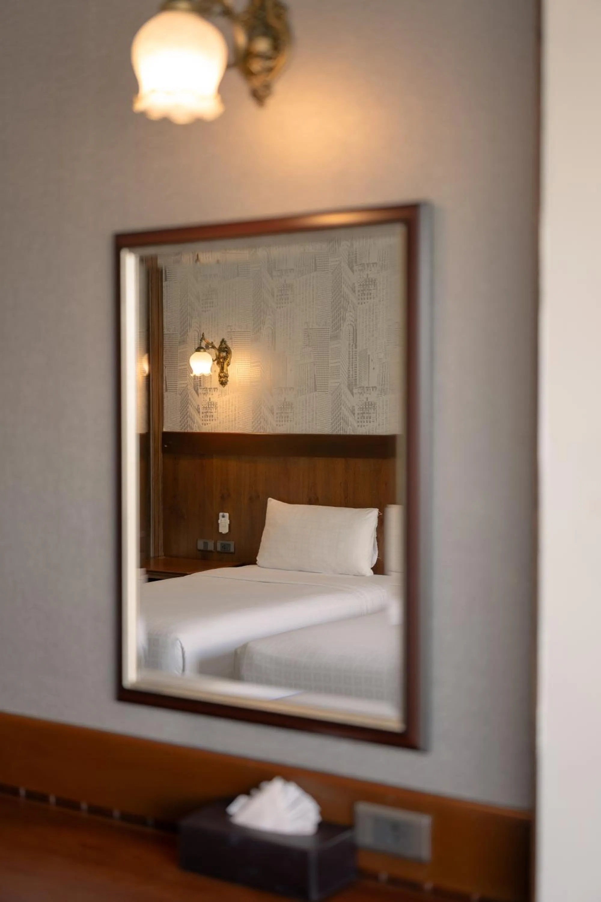 Bed in Le Erawan Phang Nga Hotel