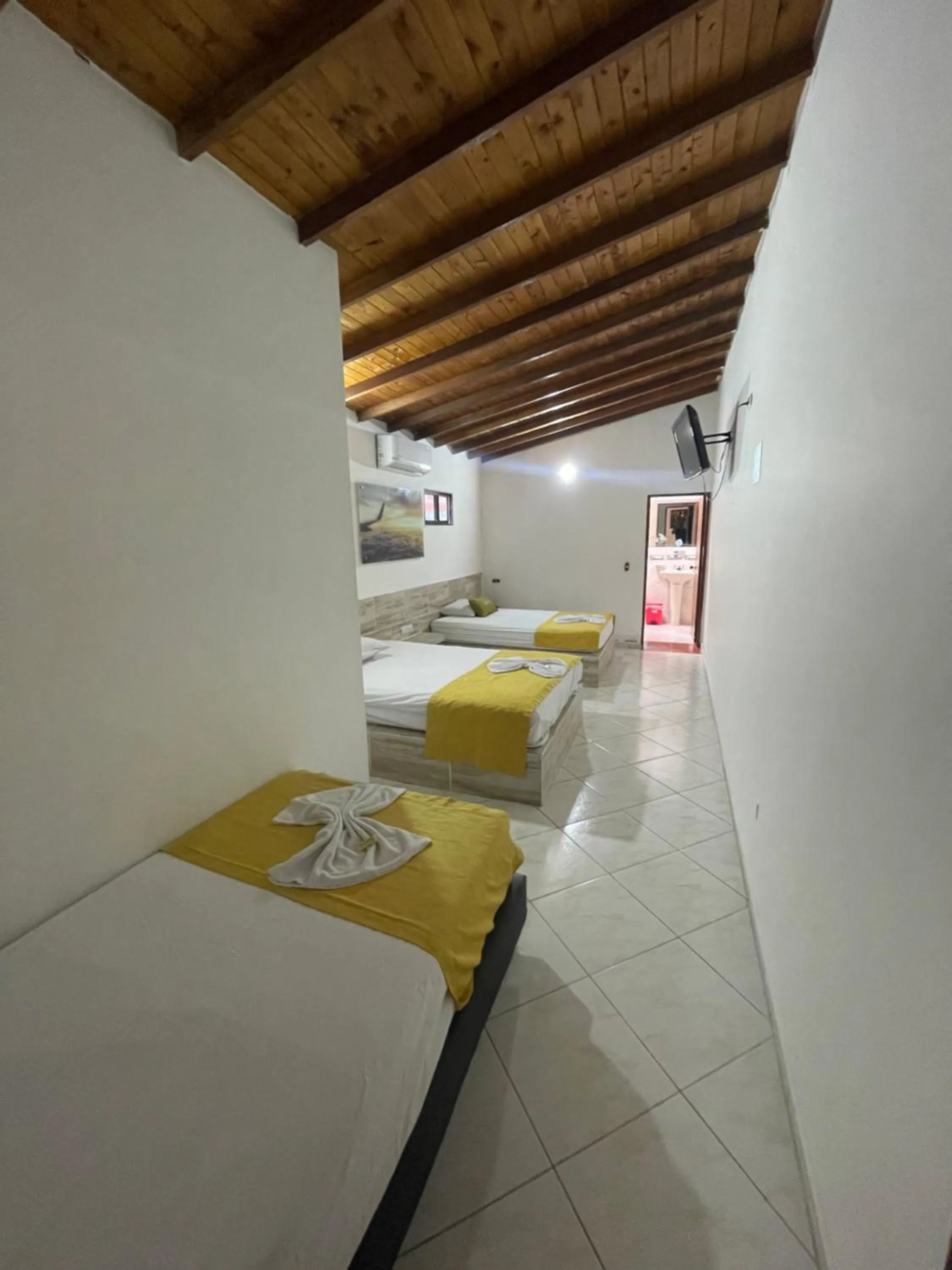 Photo of the whole room, Bed in Hotel Brisas MEDELLIN