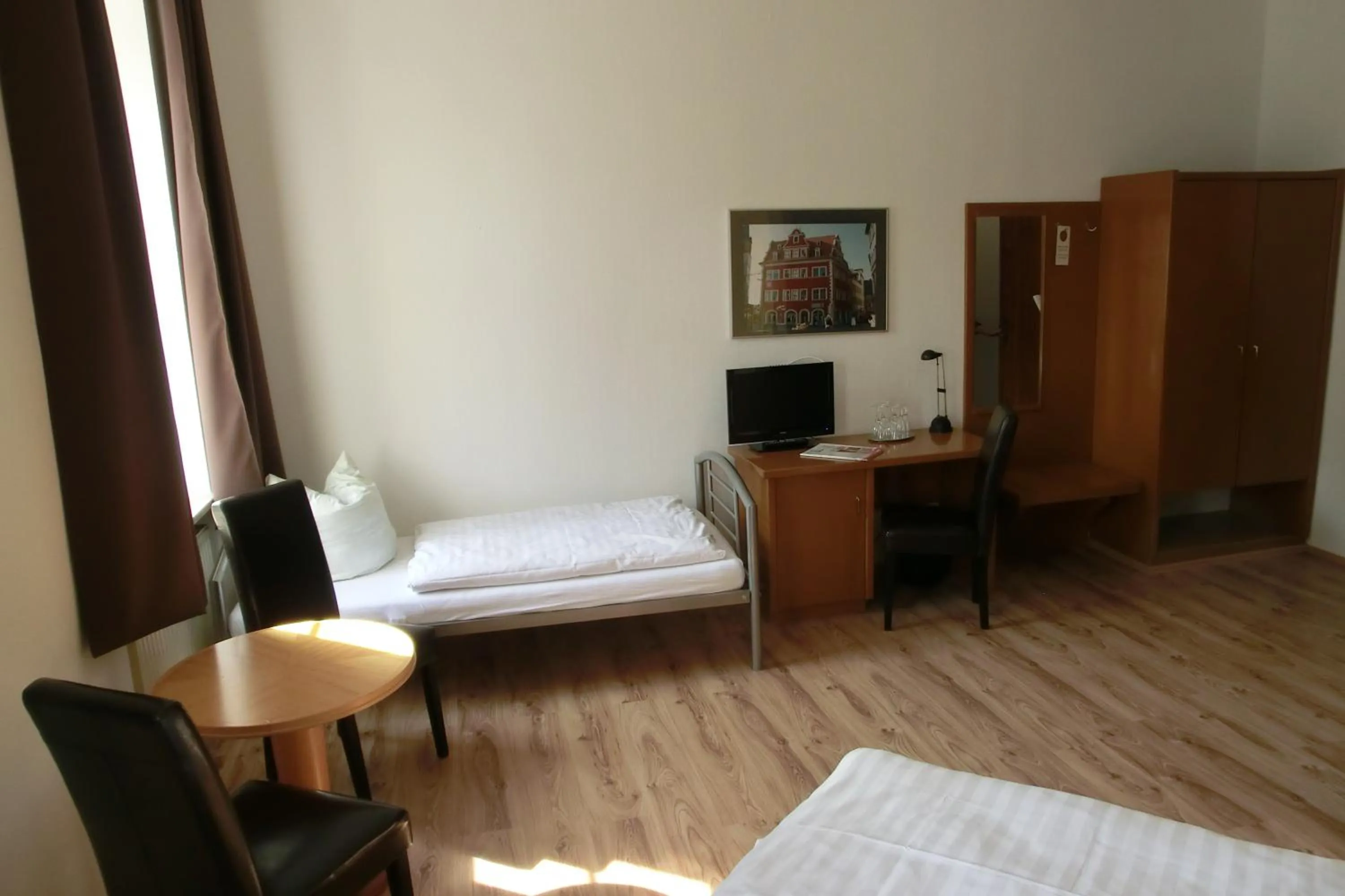 Bed in Hotel Schweizer Hof