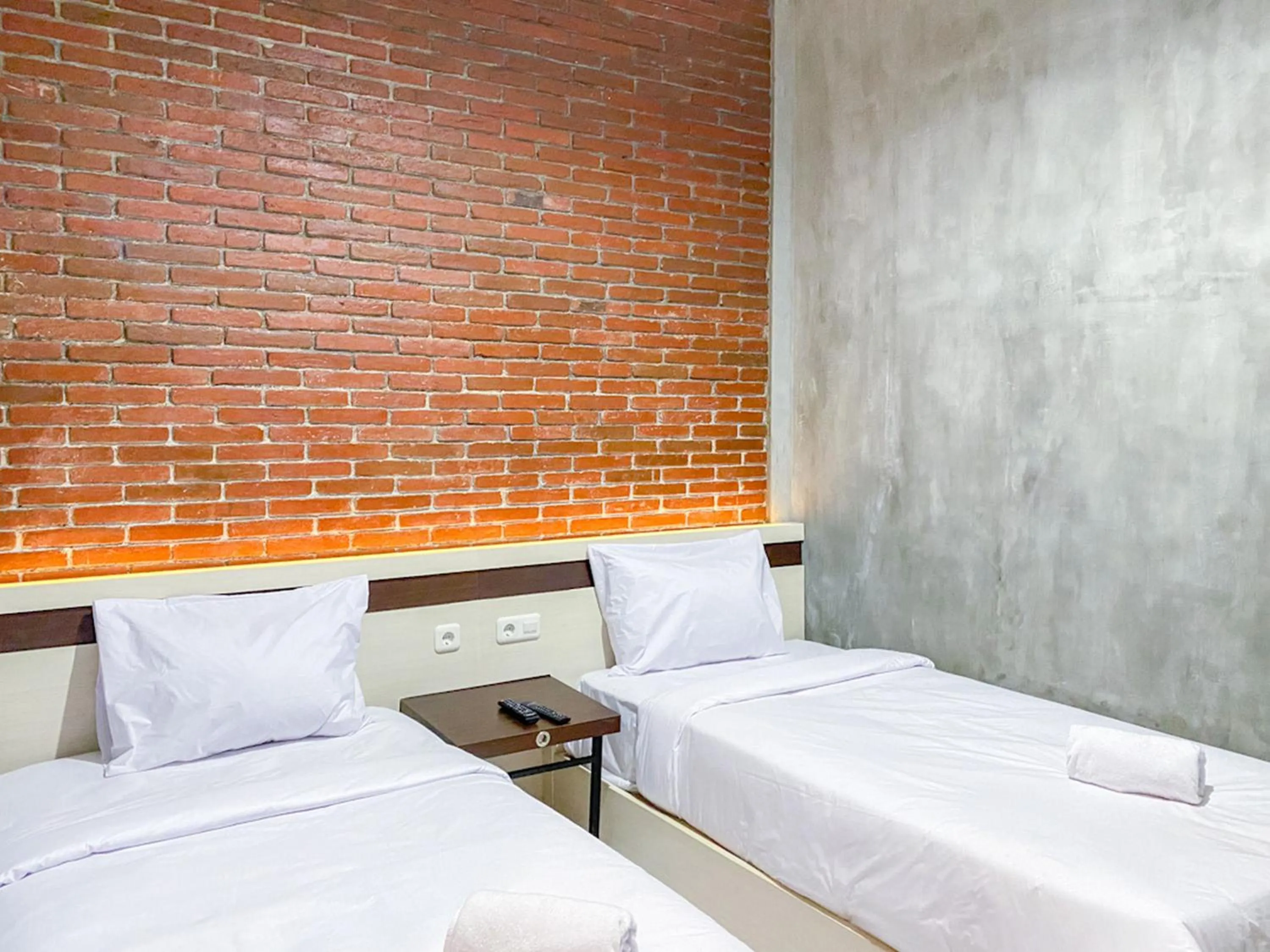 Bed in RedDoorz Syariah At Mitra Guest House