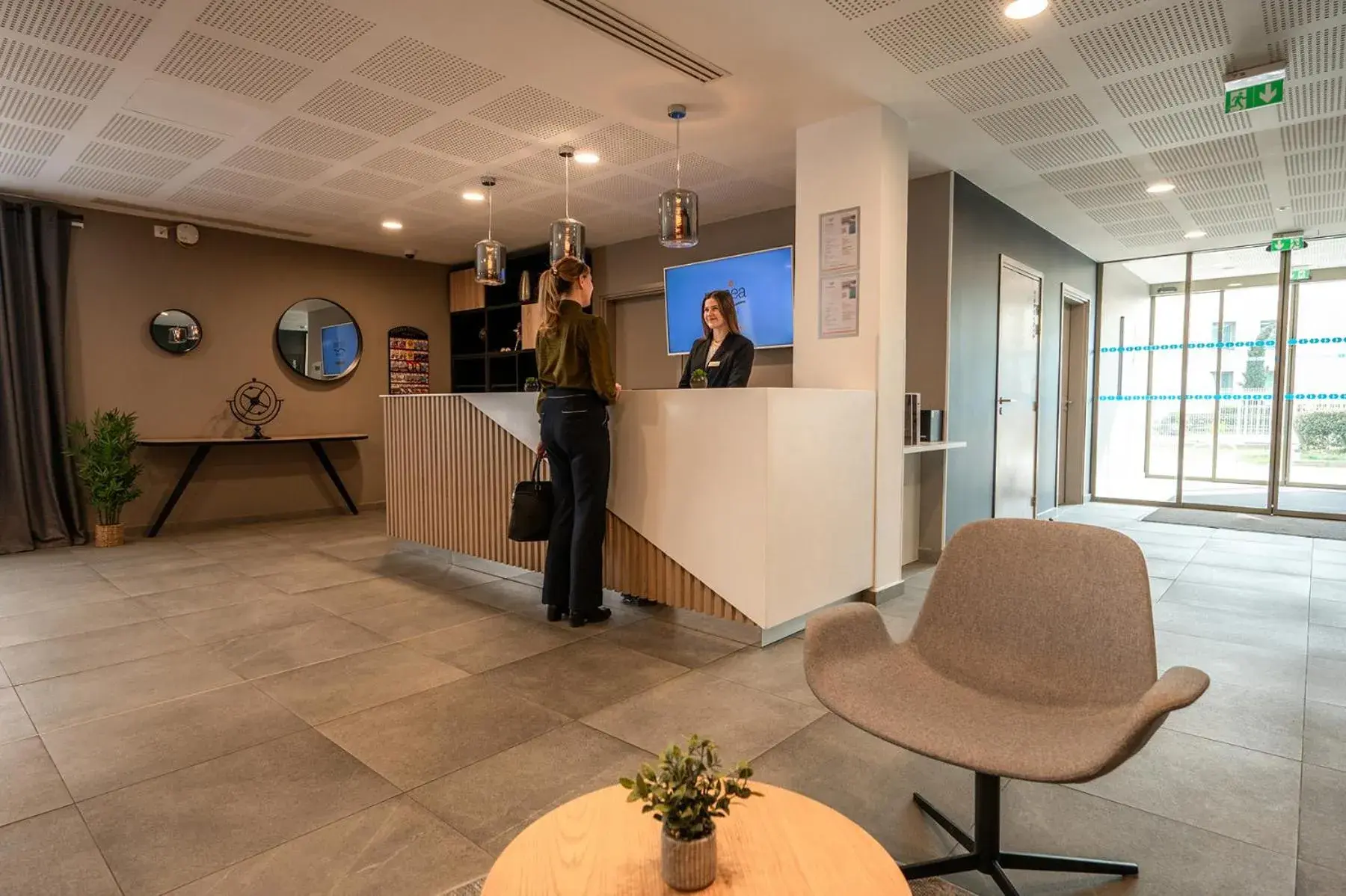 Lobby or reception in Nemea Appart Hotel Europe Velizy Villacoublay Lobby or reception in Nemea Appart Hotel Europe Velizy Villacoublay