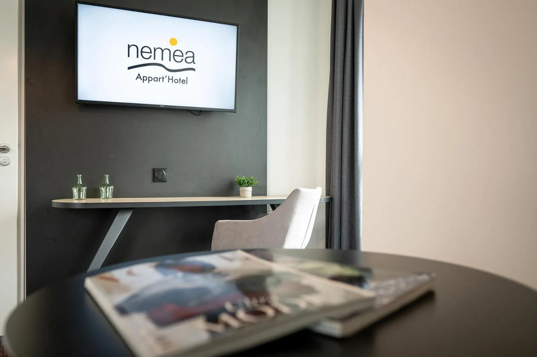 TV and multimedia in Nemea Appart Hotel Europe Velizy Villacoublay