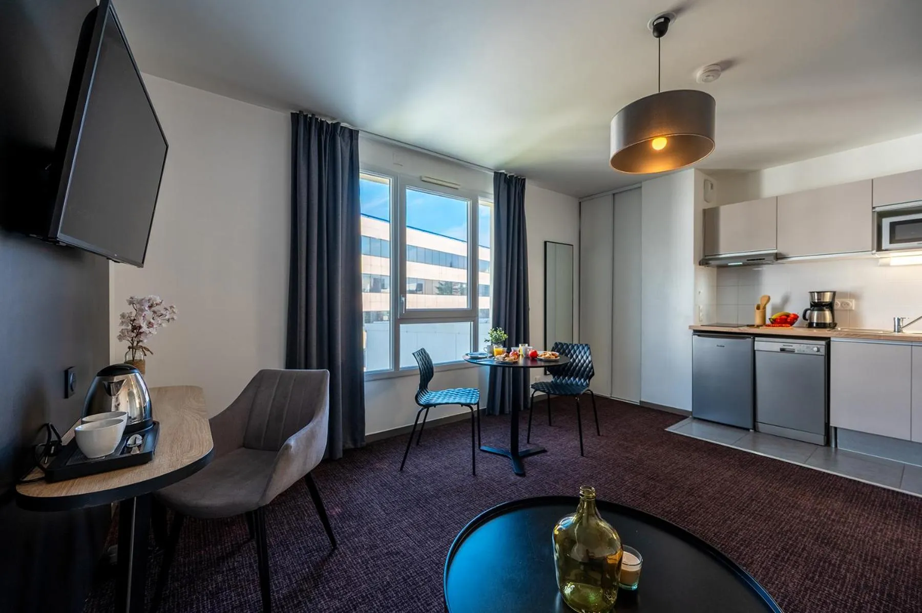 Photo of the whole room in Nemea Appart Hotel Europe Velizy Villacoublay