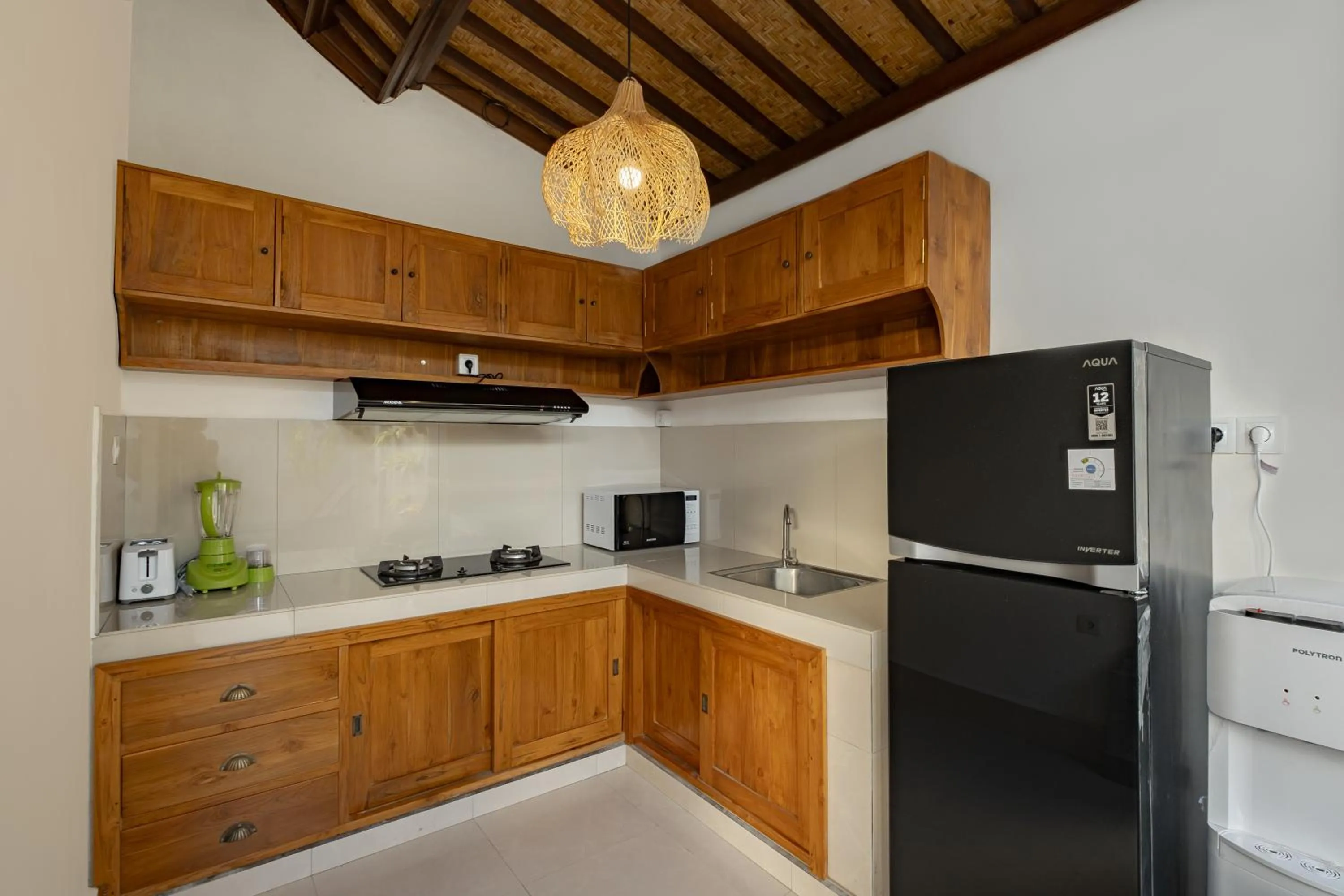 Kitchen or kitchenette in Villa Wananta