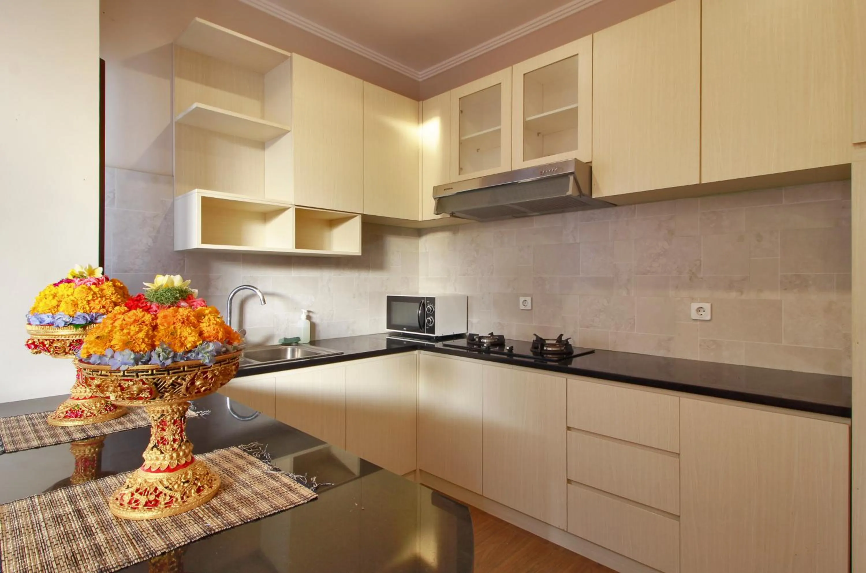 Kitchen or kitchenette in Villa Wananta