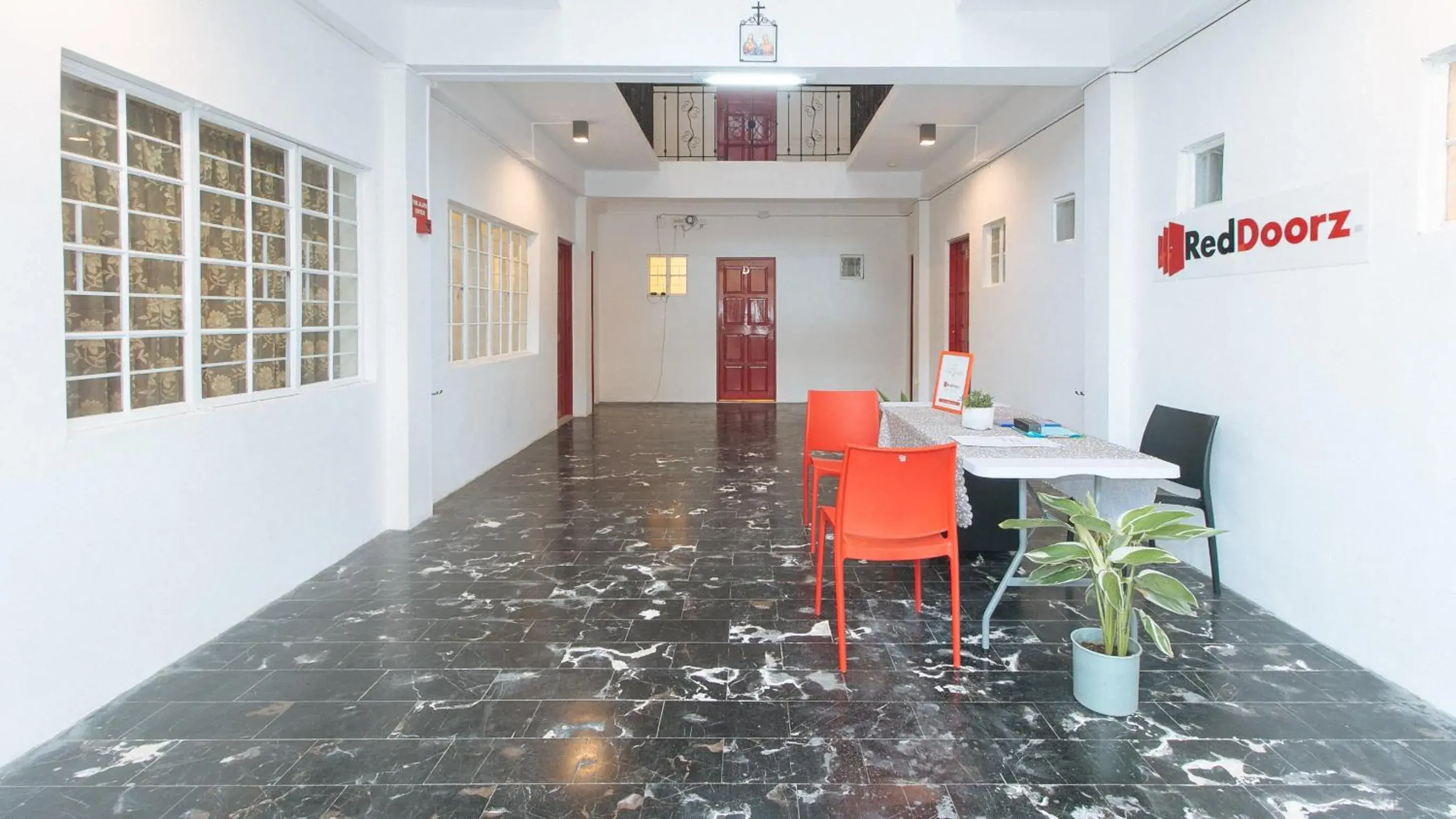 Lobby or reception in RedDoorz at V-Cloud Hills near De La Salle Dasmarinas Cavite Lobby or reception in RedDoorz at V-Cloud Hills near De La Salle Dasmarinas Cavite