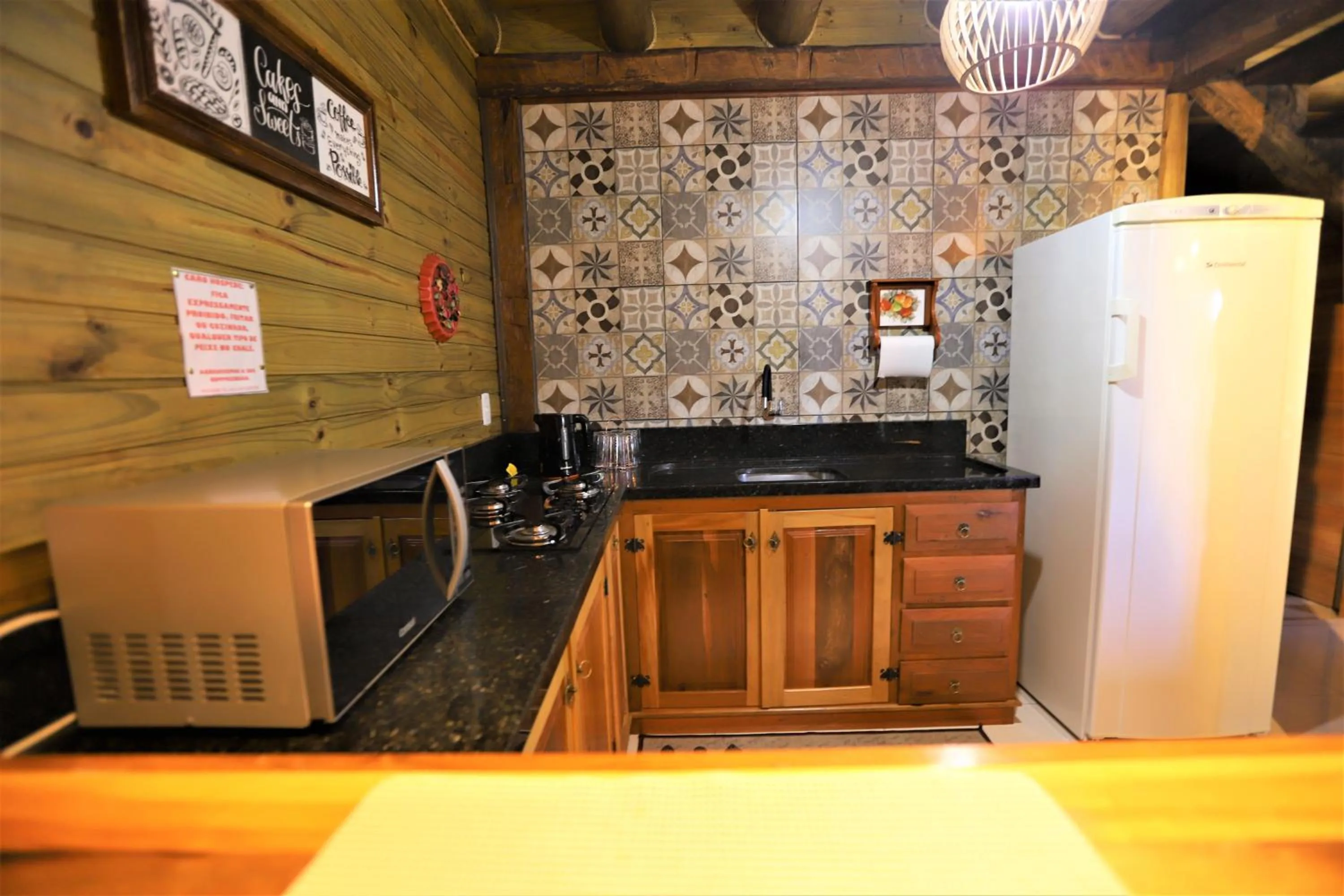 Kitchen or kitchenette in Pousada Village dos Canyons