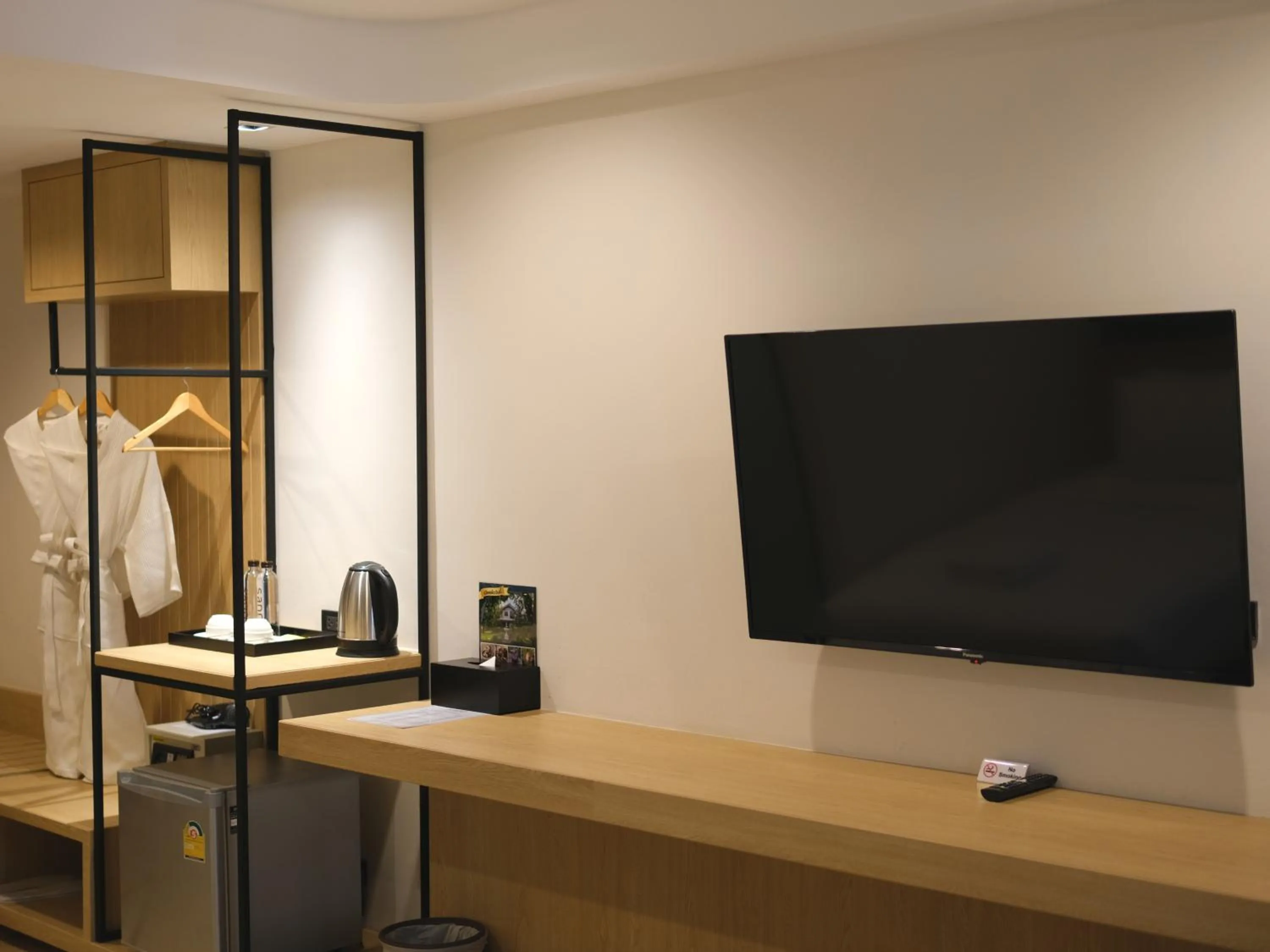 Communal lounge/ TV room in Sann Boutique Hotel