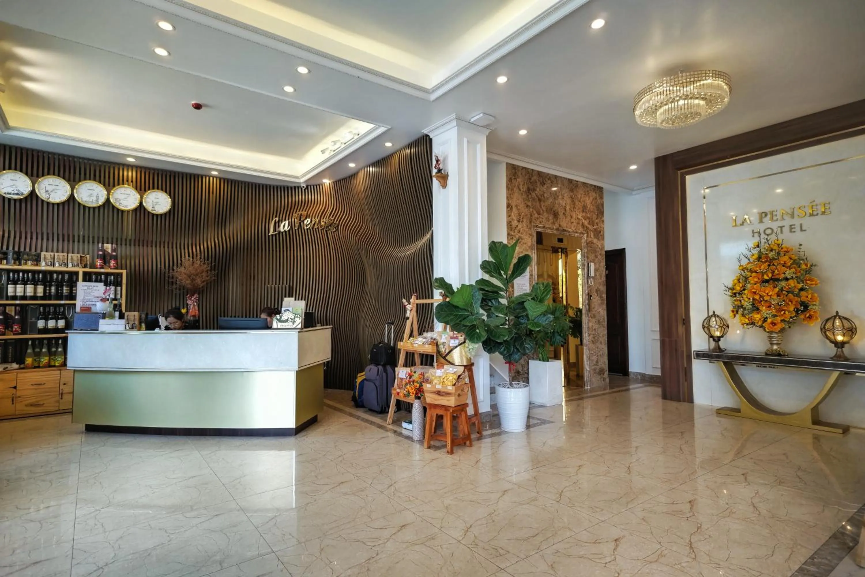 Communal lounge/ TV room in La Pense'e Hotel - Dalat