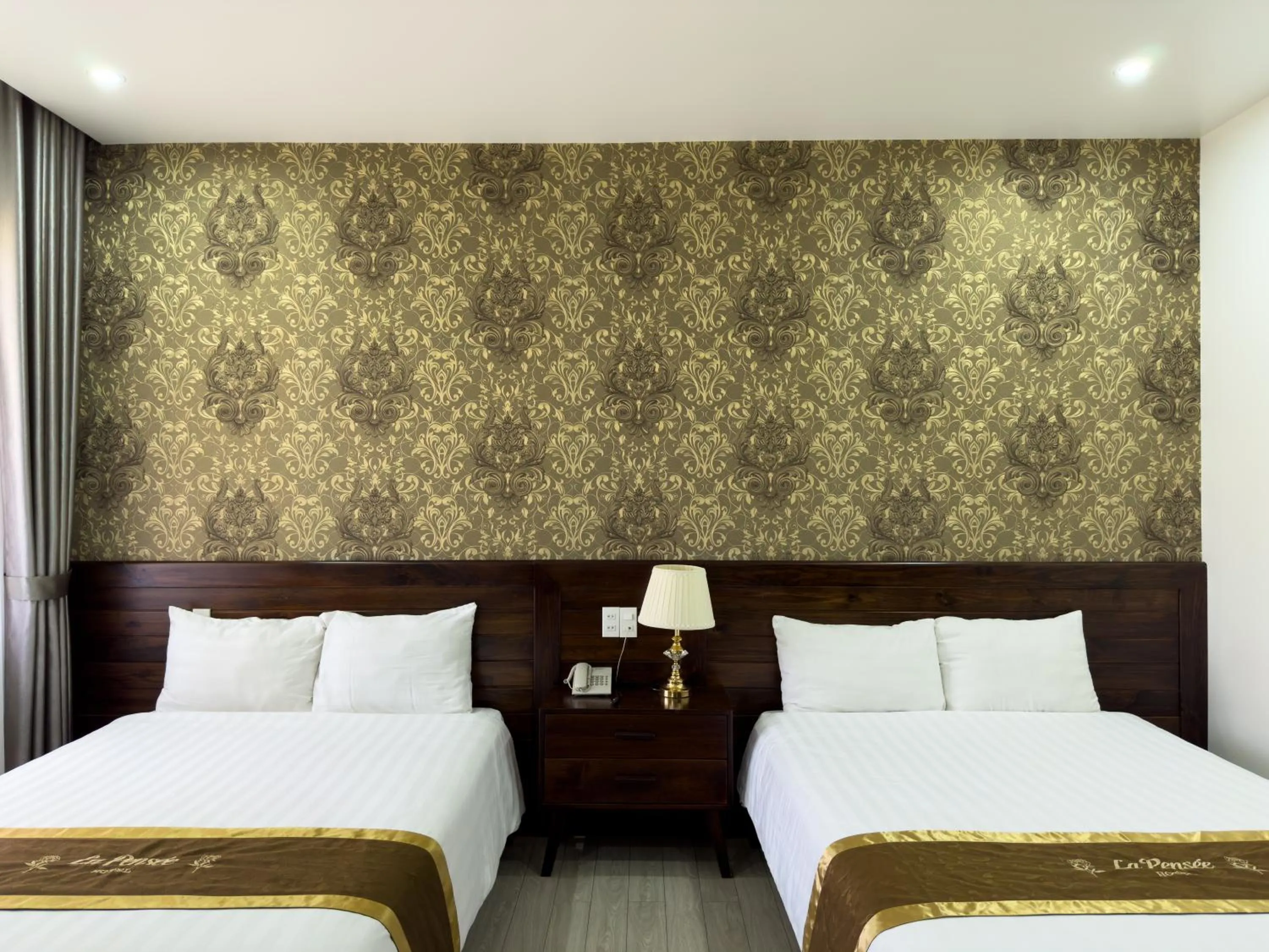 Bed in La Pense'e Hotel - Dalat