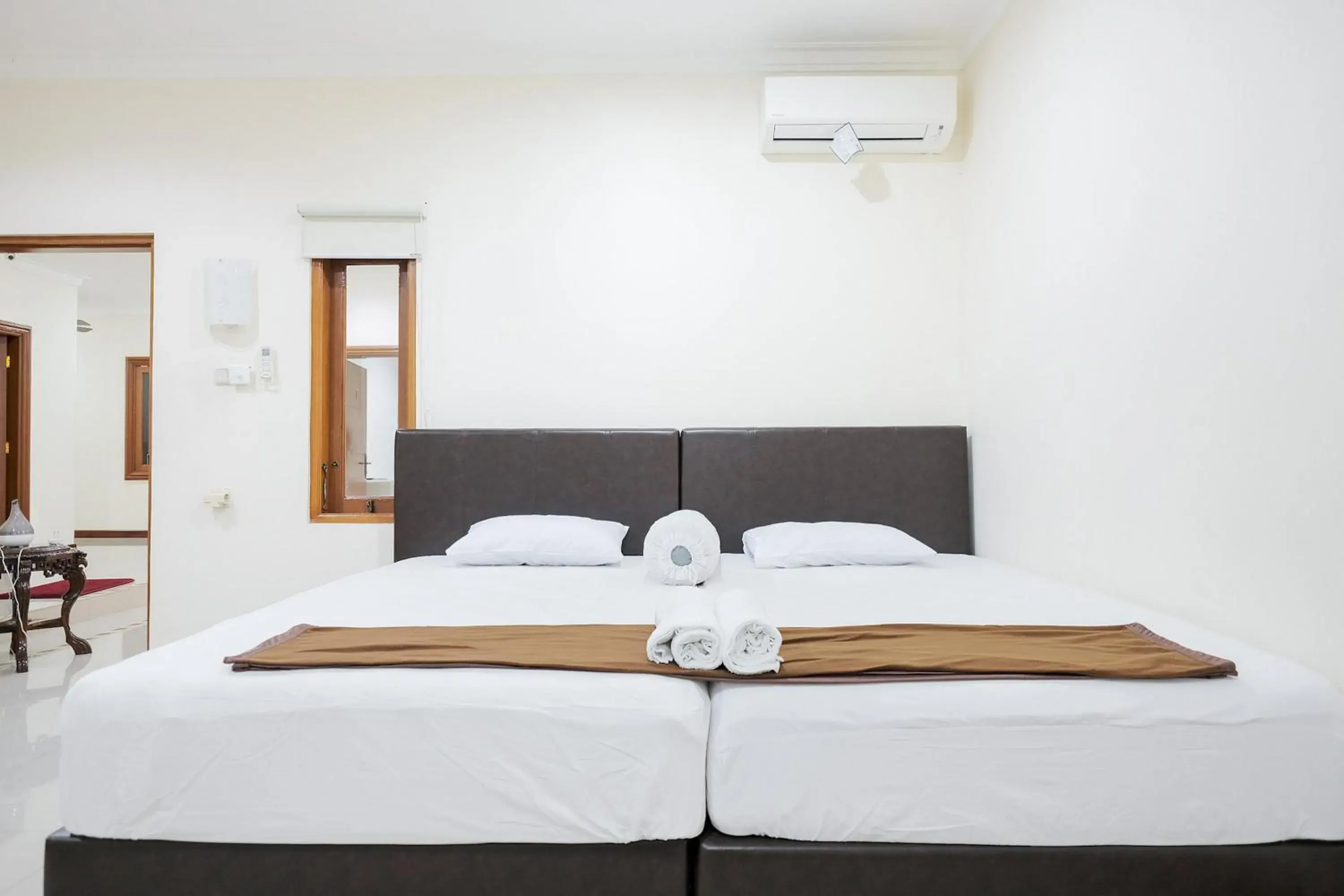 Bed in wisma delapan Mitra RedDoorz Bed in wisma delapan Mitra RedDoorz