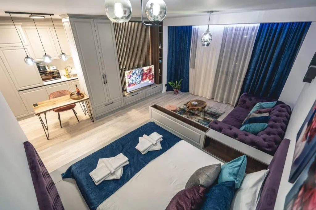 Communal lounge/ TV room, Bed in Briana Luxury Panoramic View