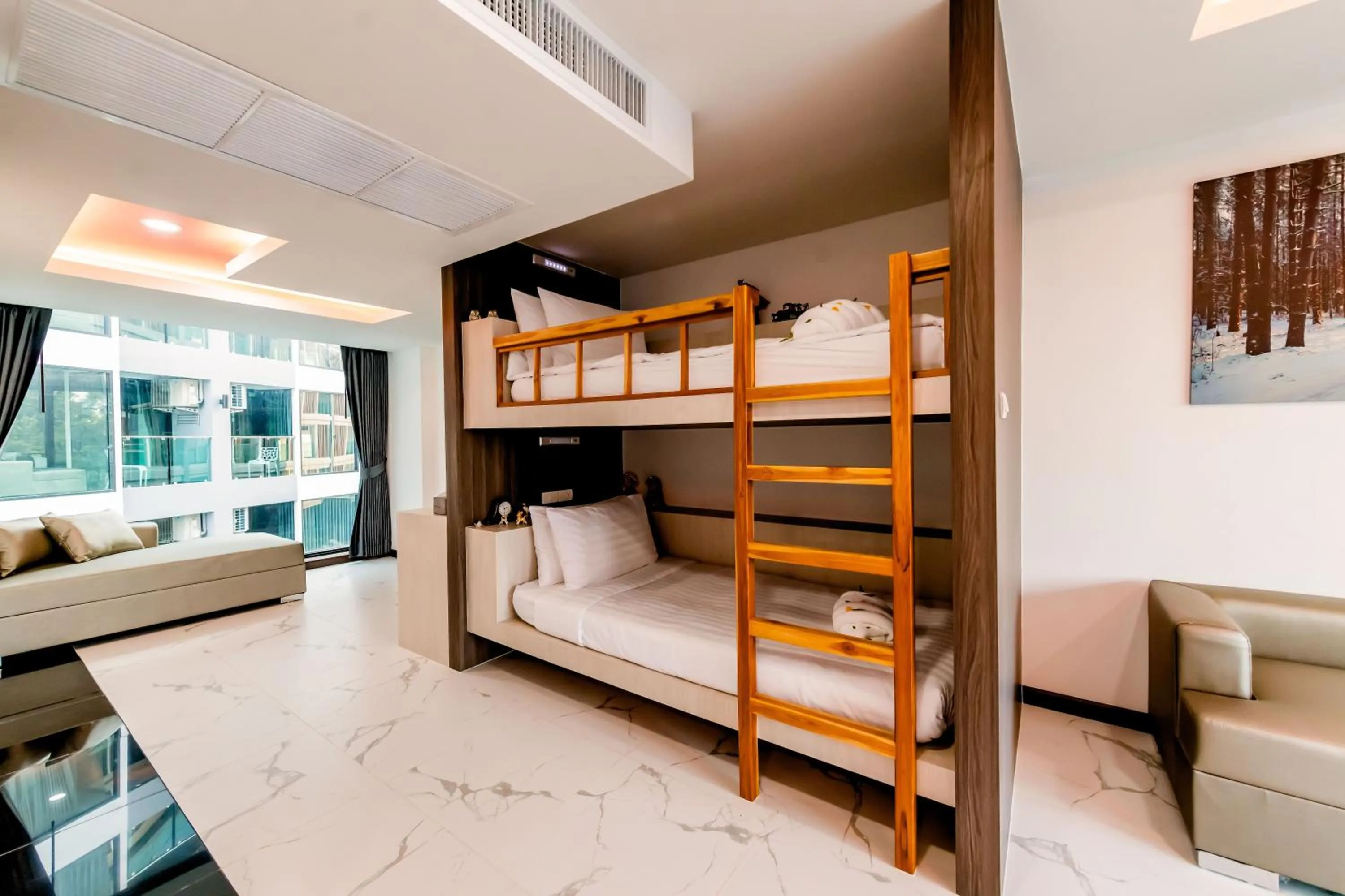 Bed in The Proud Hotel Pattaya - SHA Certified