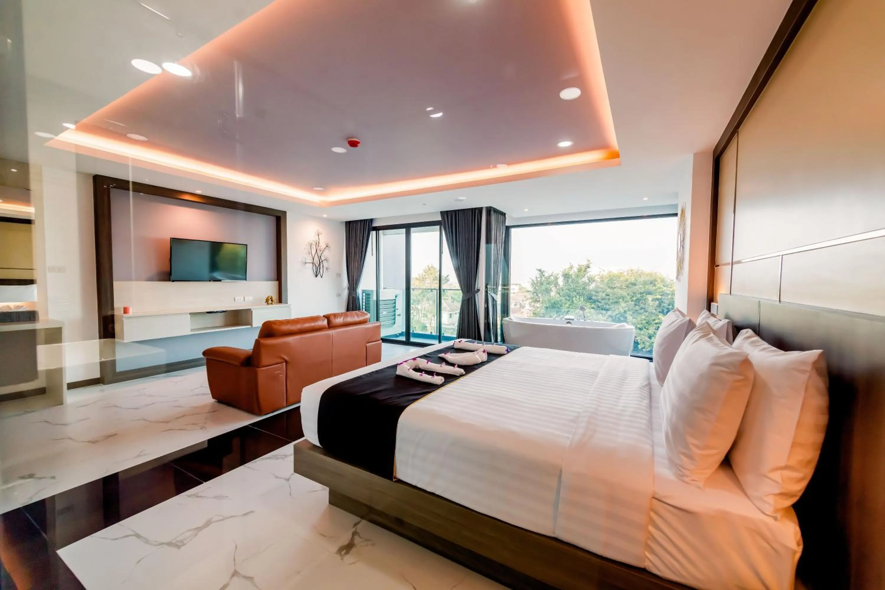 Bed in The Proud Hotel Pattaya - SHA Certified