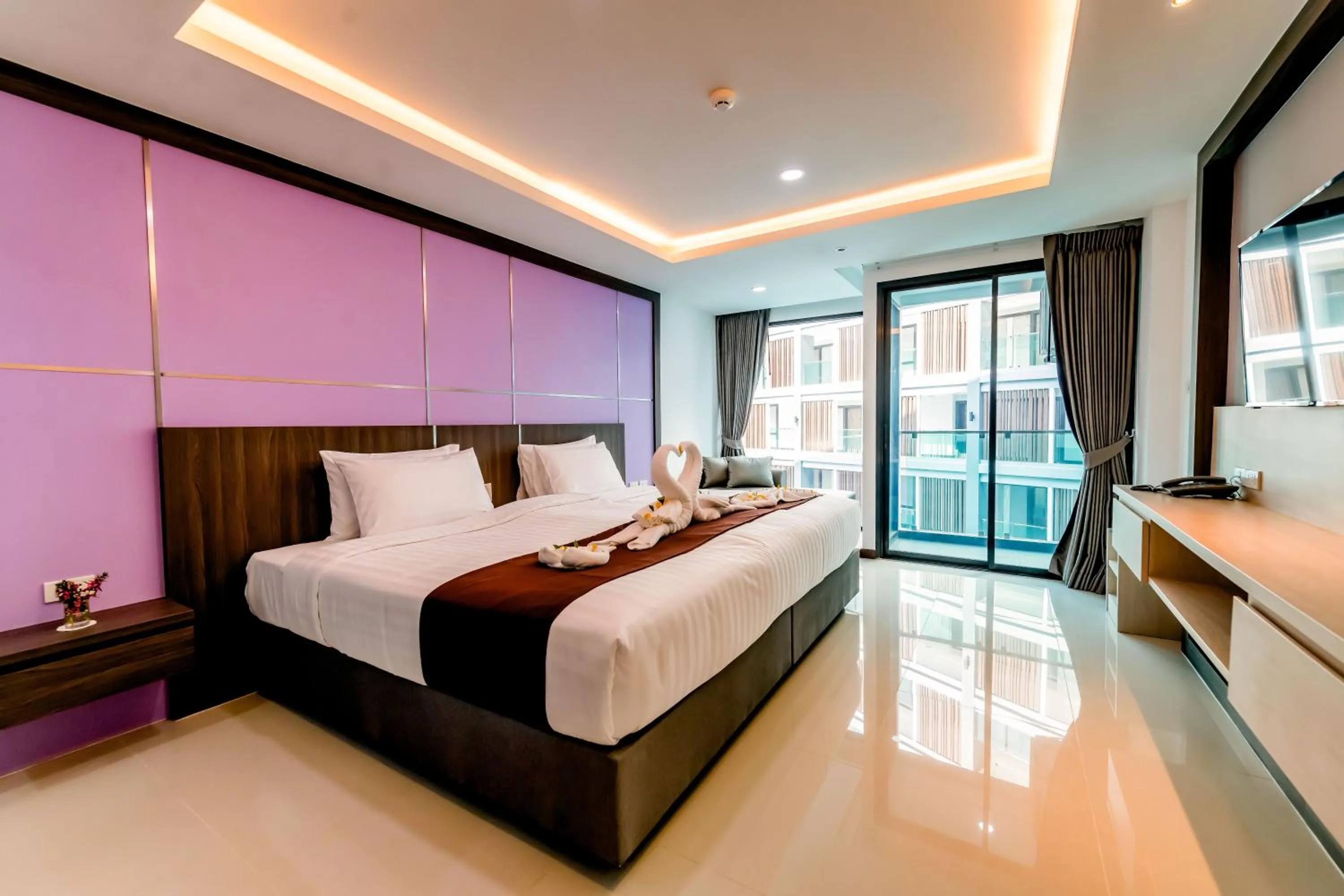 Bed in The Proud Hotel Pattaya - SHA Certified