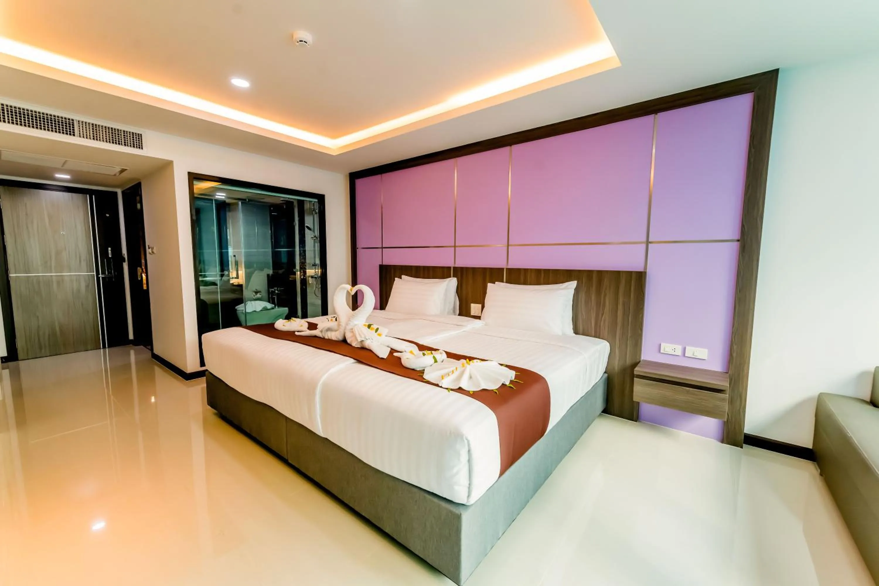 Bed in The Proud Hotel Pattaya - SHA Certified