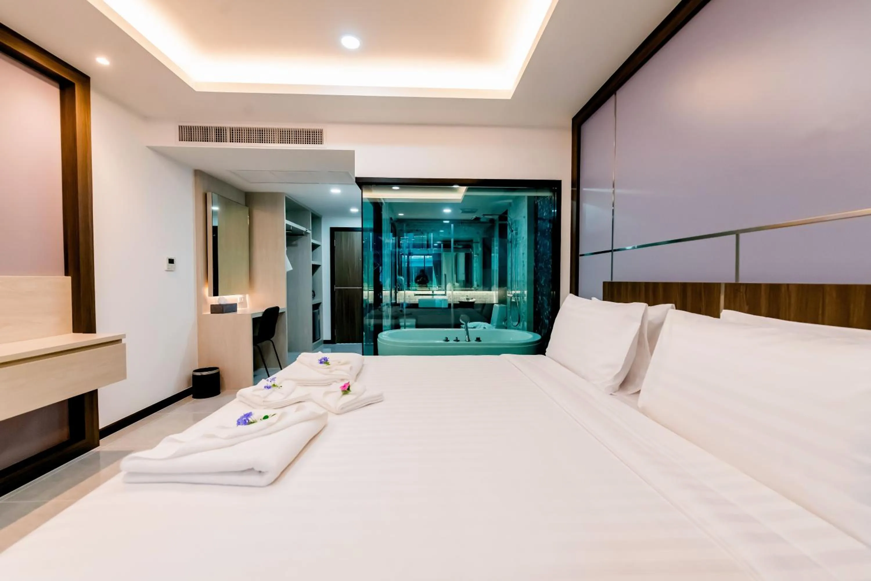 Bed in The Proud Hotel Pattaya - SHA Certified