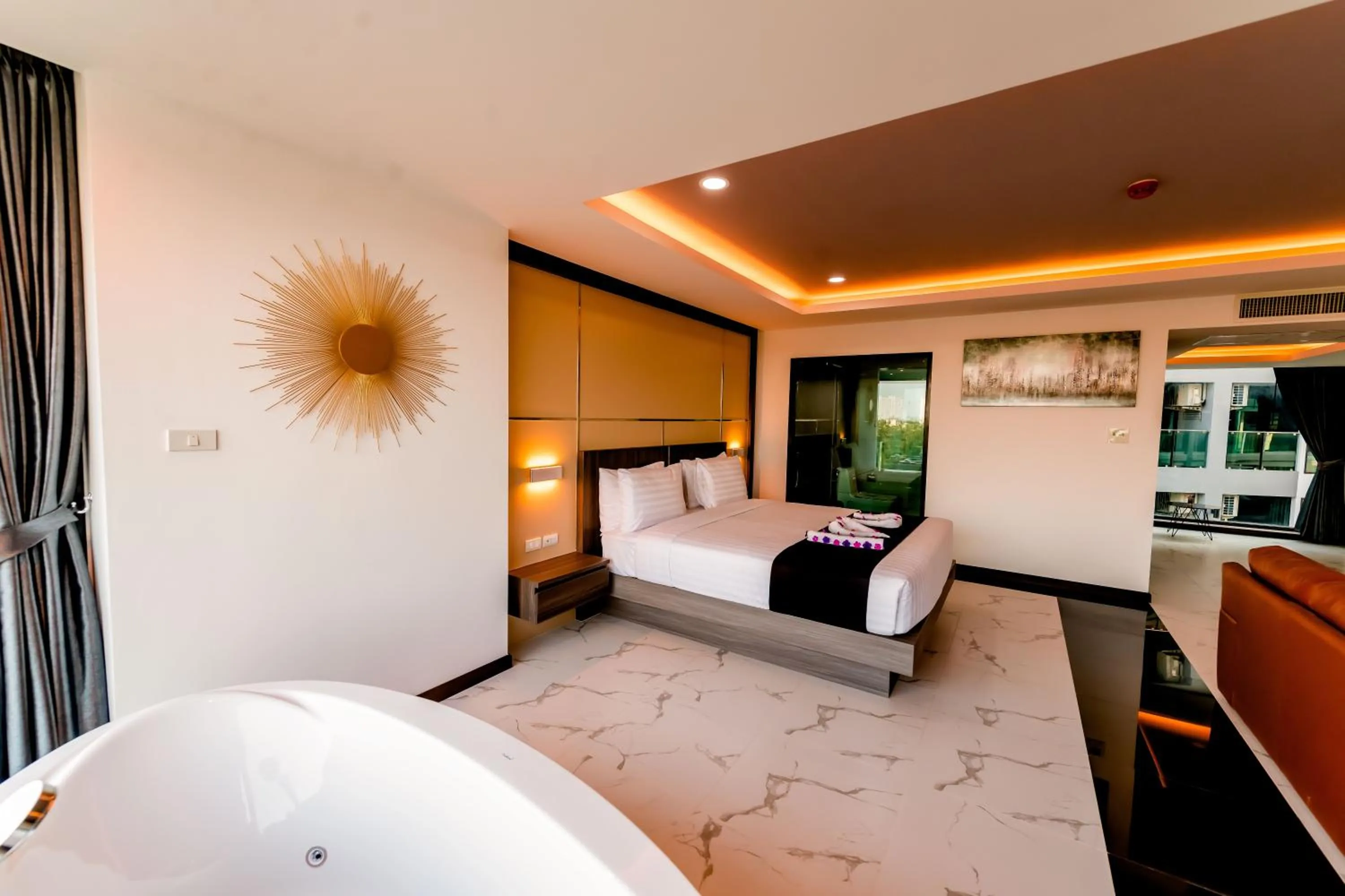 Bed in The Proud Hotel Pattaya - SHA Certified