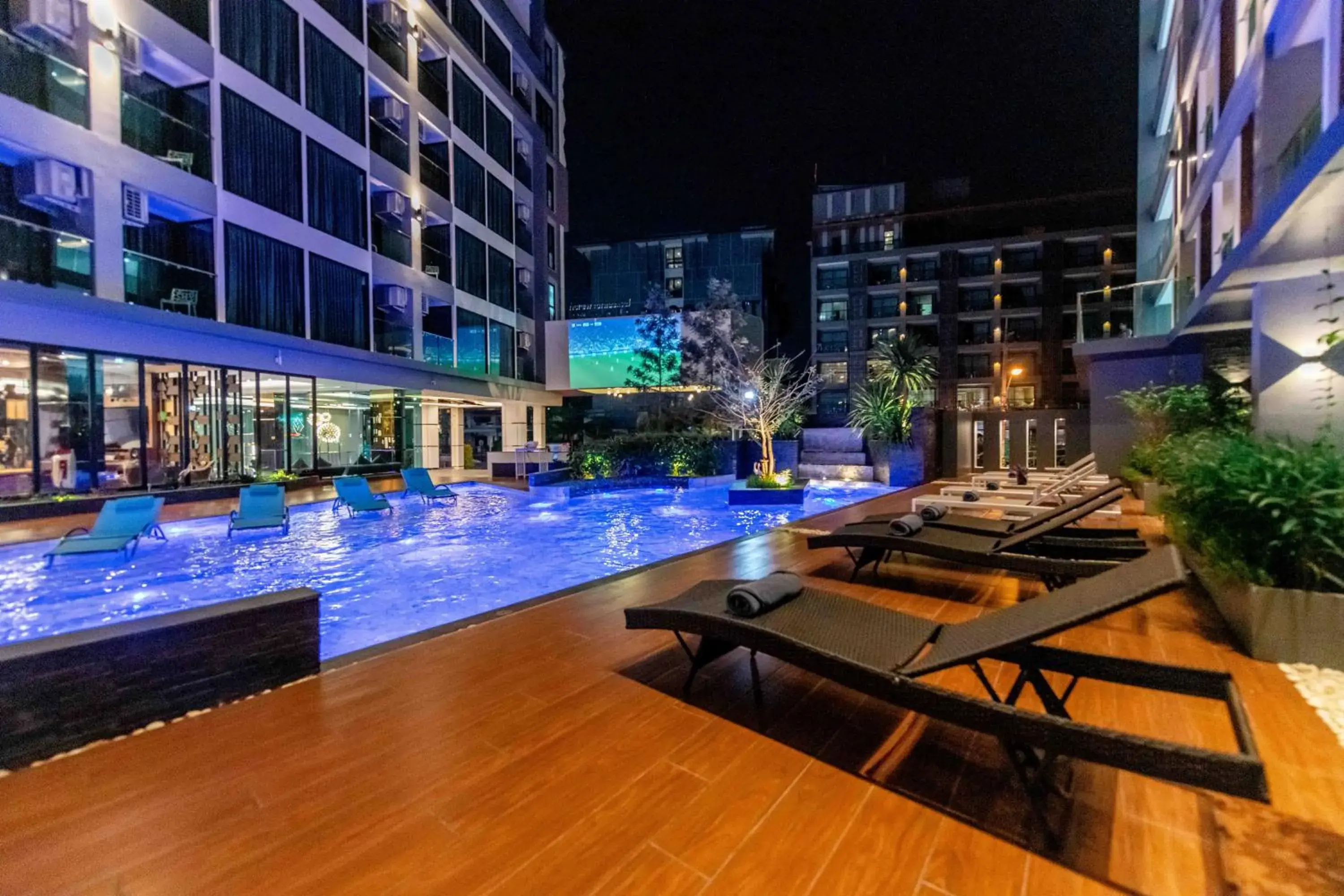 Swimming pool in The Proud Hotel Pattaya - SHA Certified Swimming pool in The Proud Hotel Pattaya - SHA Certified