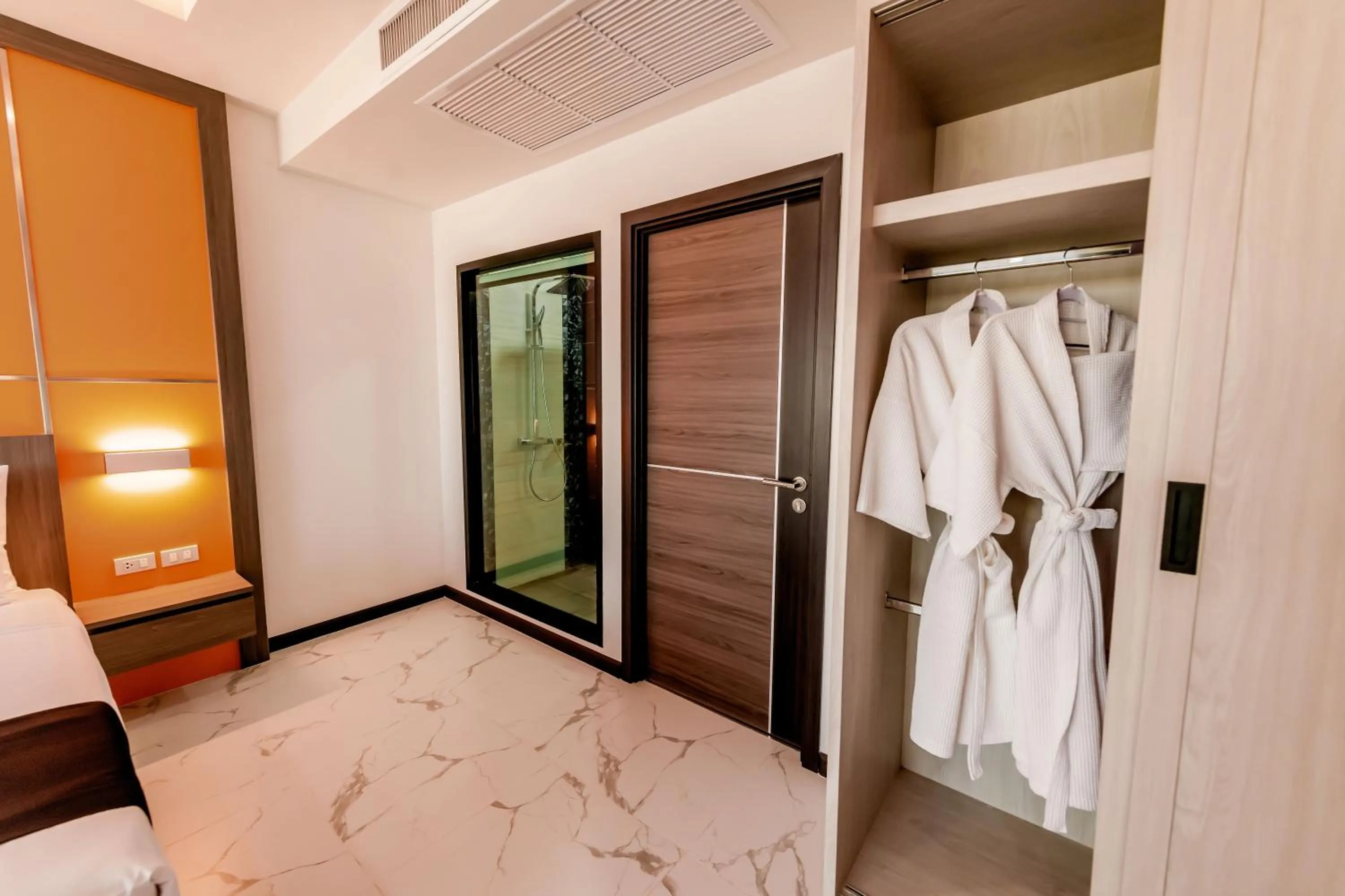 Bed in The Proud Hotel Pattaya - SHA Certified