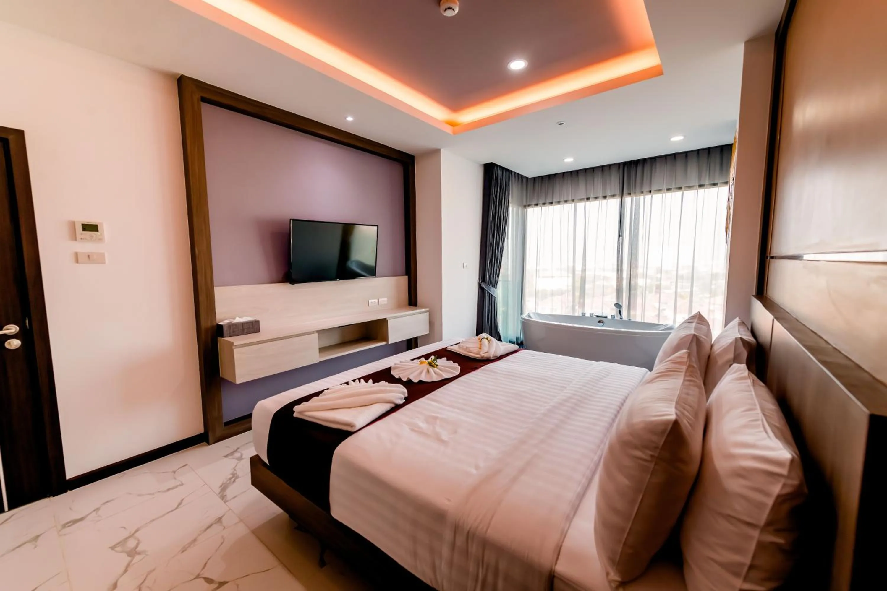 Bed in The Proud Hotel Pattaya - SHA Certified
