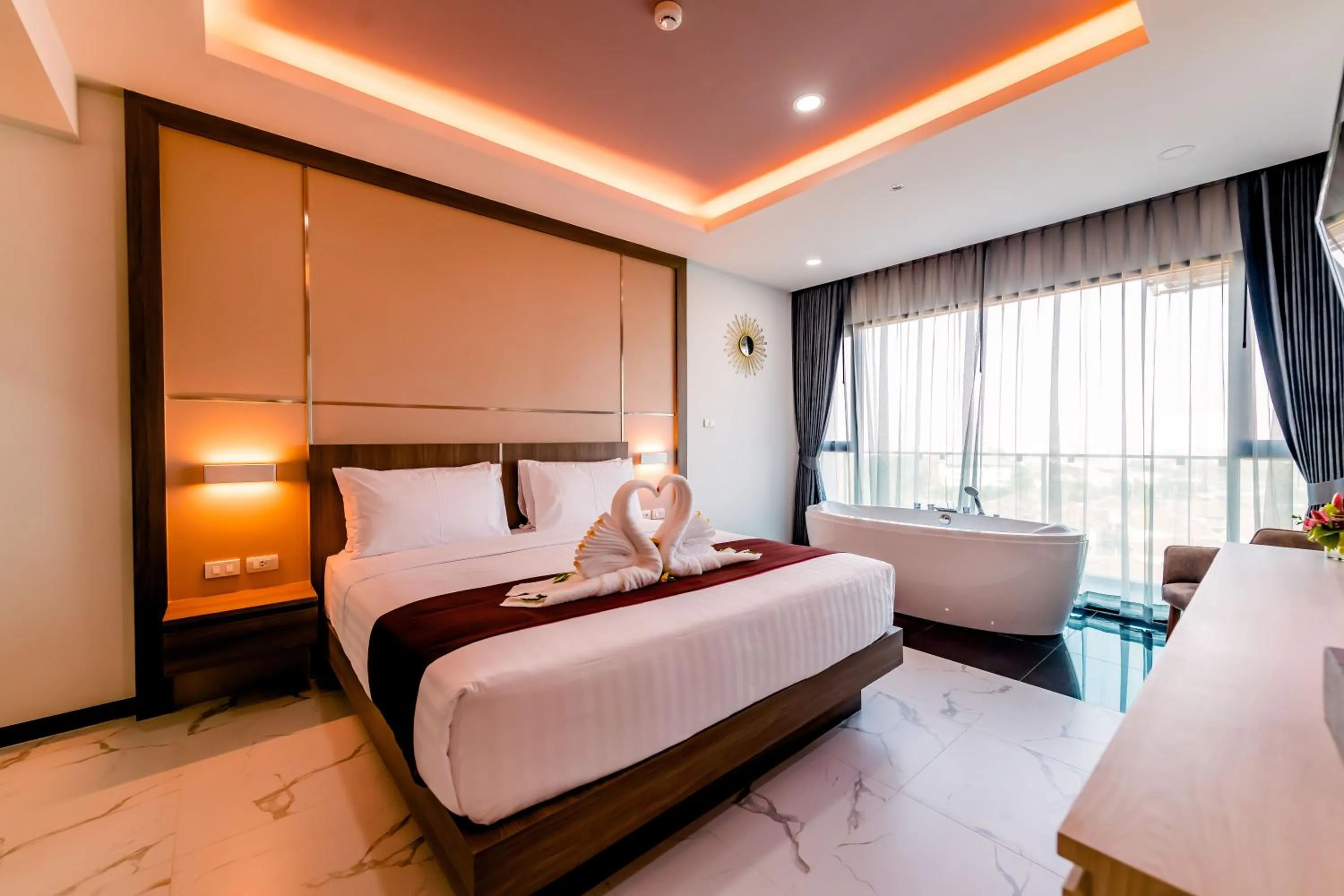 Bed in The Proud Hotel Pattaya - SHA Certified
