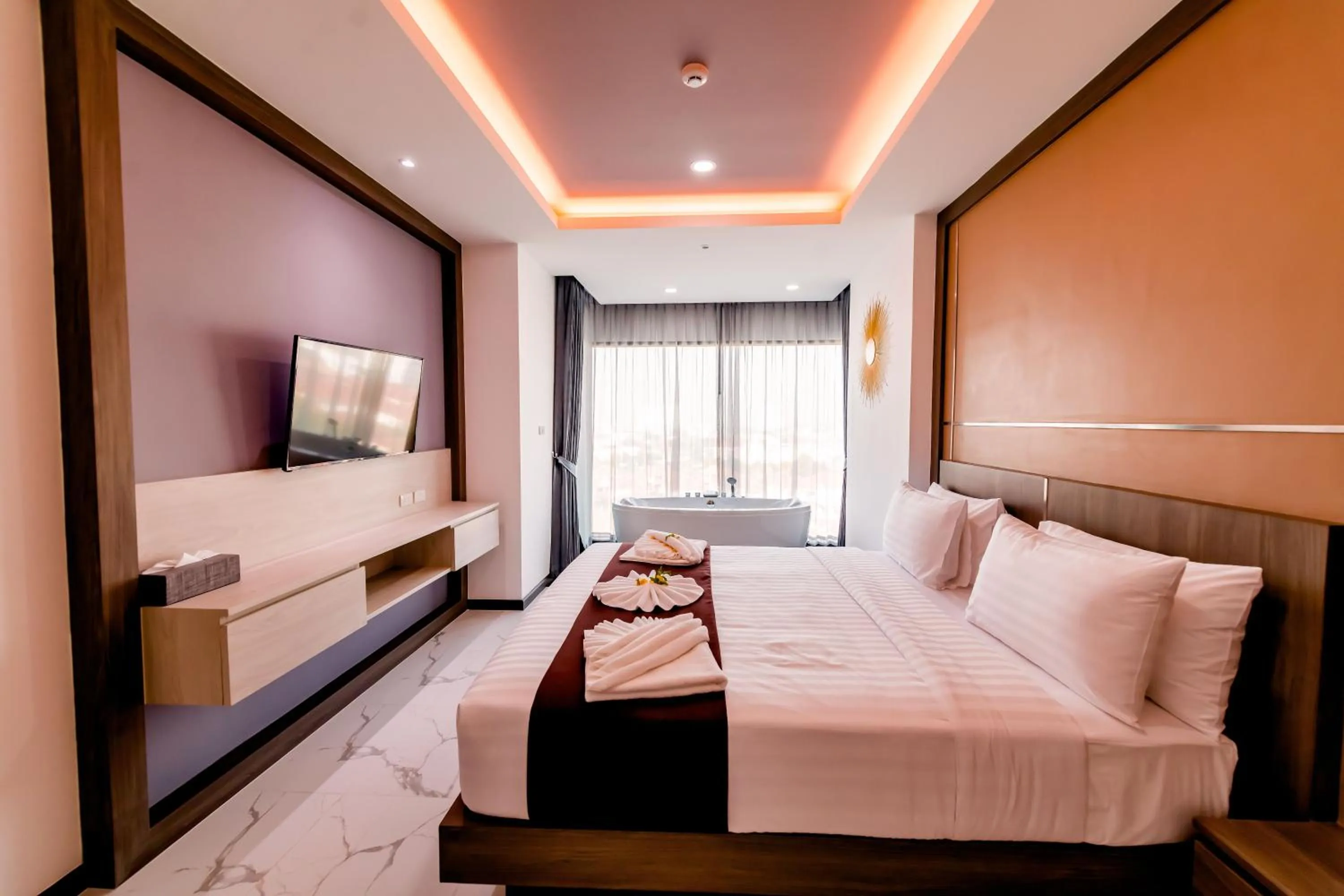 Bed in The Proud Hotel Pattaya - SHA Certified