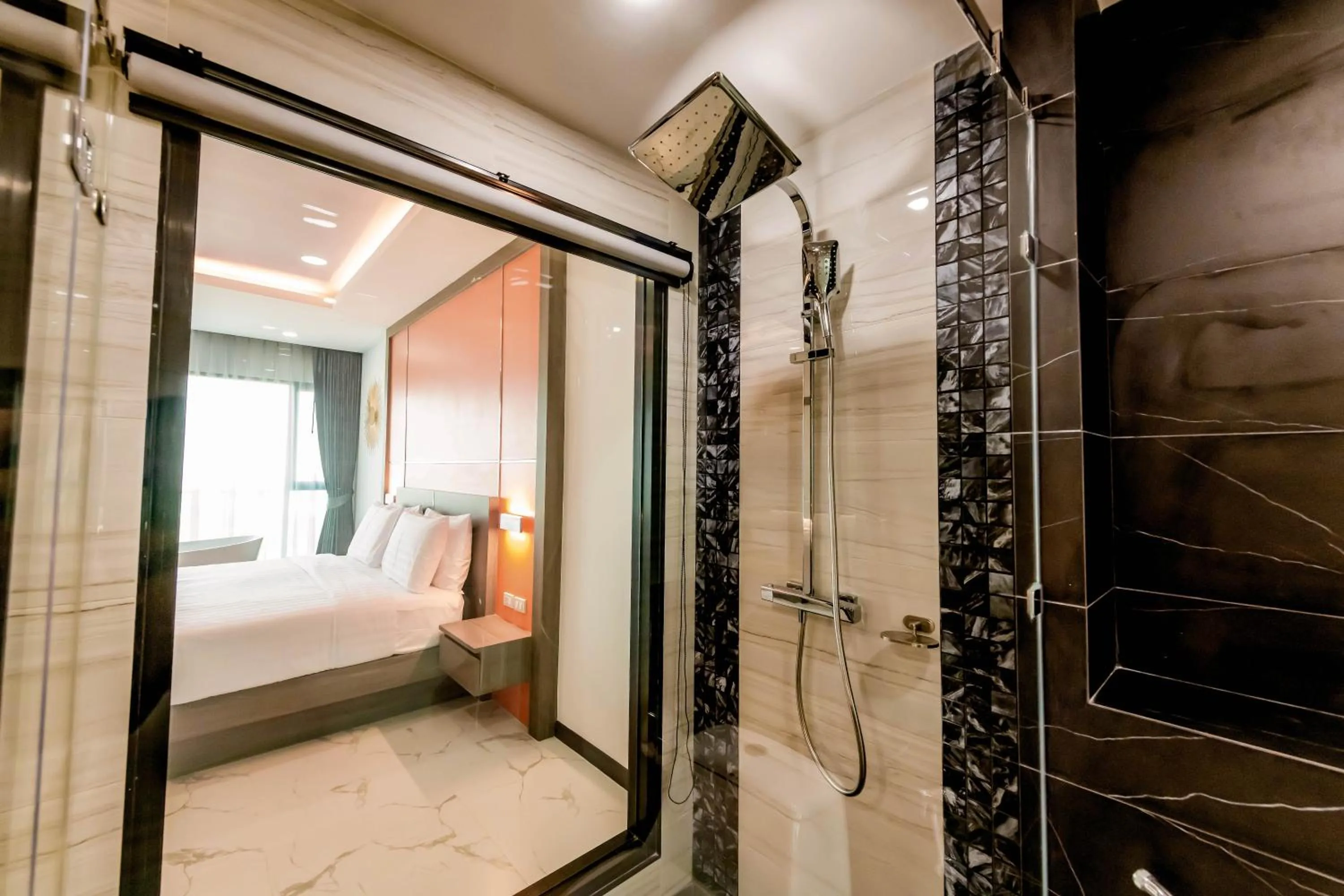 Bed in The Proud Hotel Pattaya - SHA Certified