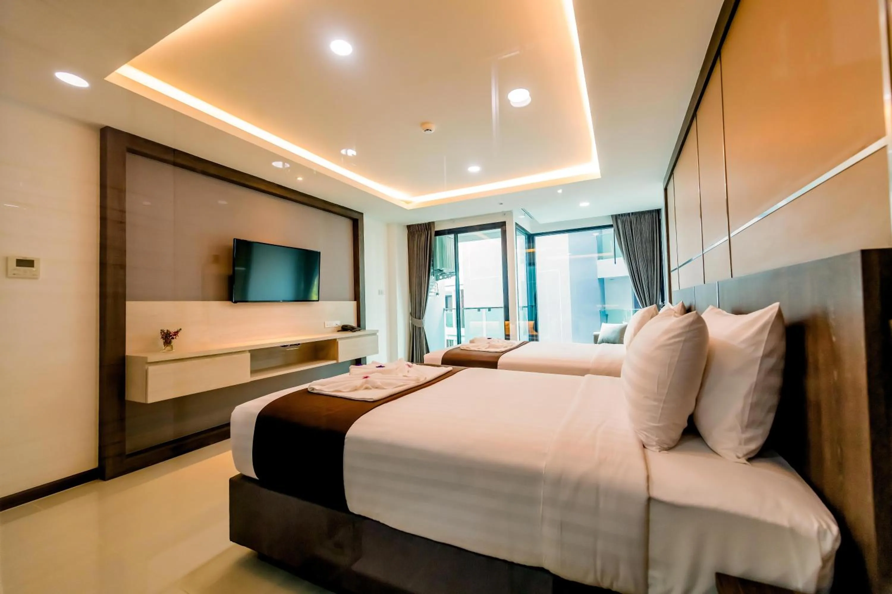 Bed in The Proud Hotel Pattaya - SHA Certified