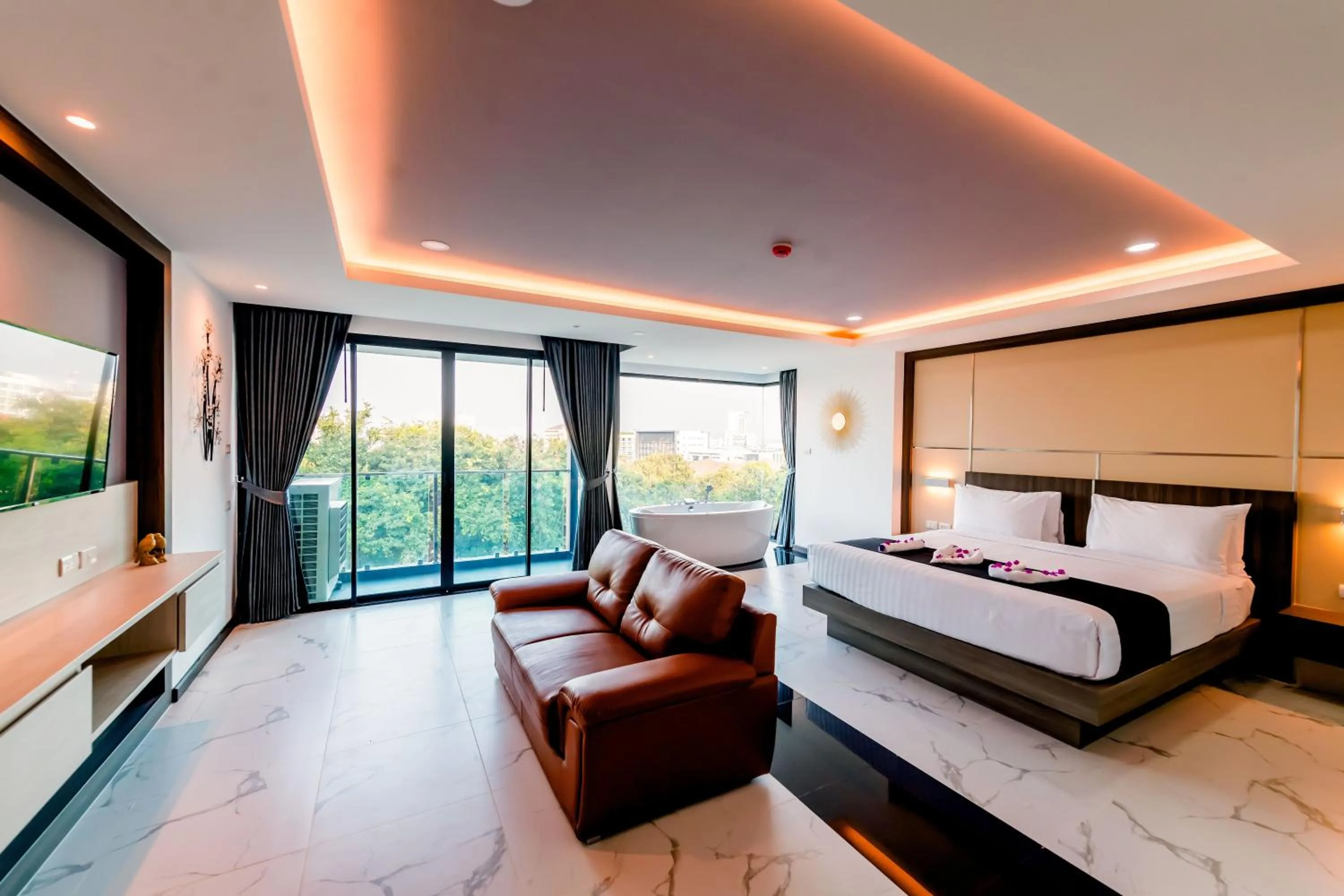 Bed in The Proud Hotel Pattaya - SHA Certified