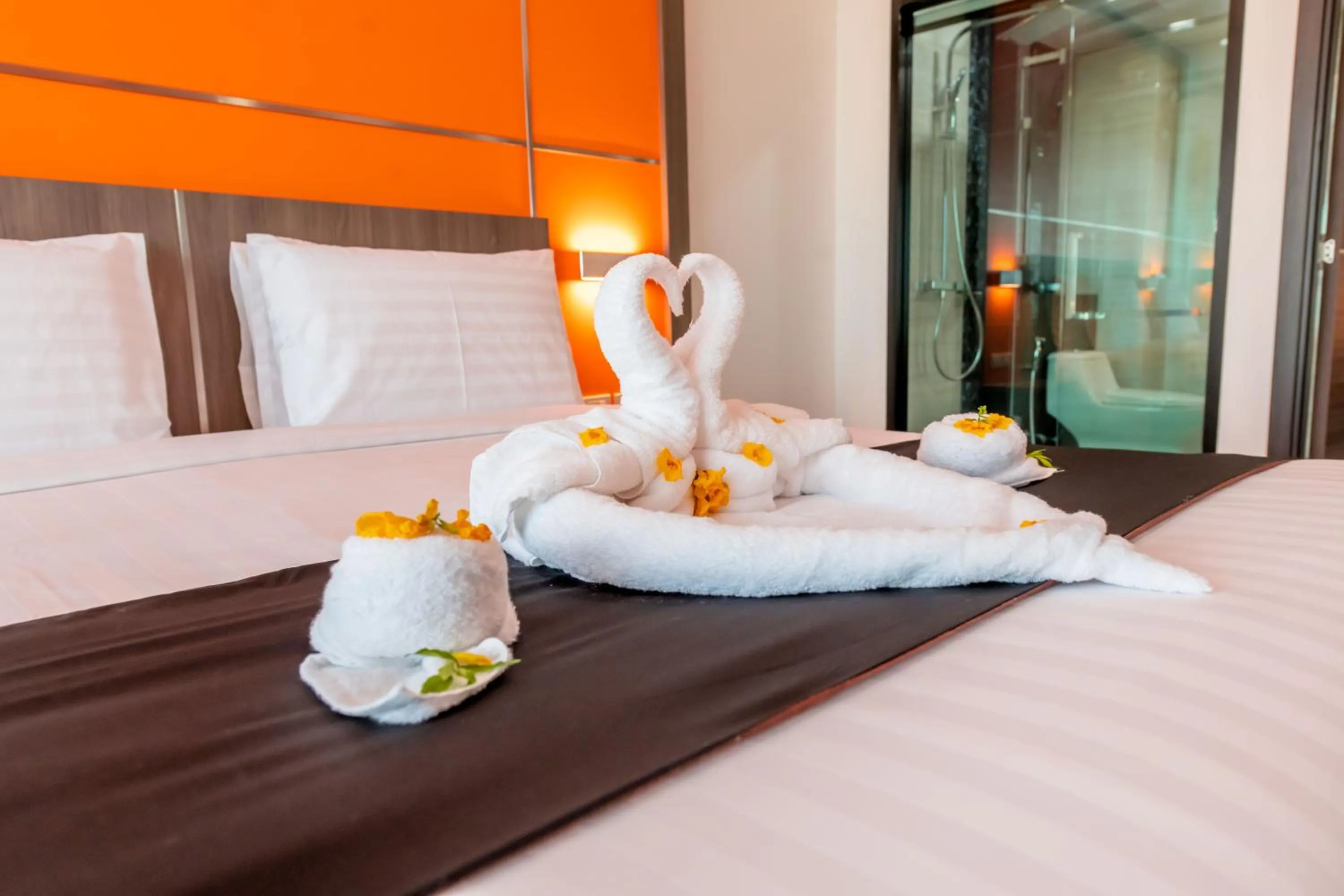 Bed in The Proud Hotel Pattaya - SHA Certified