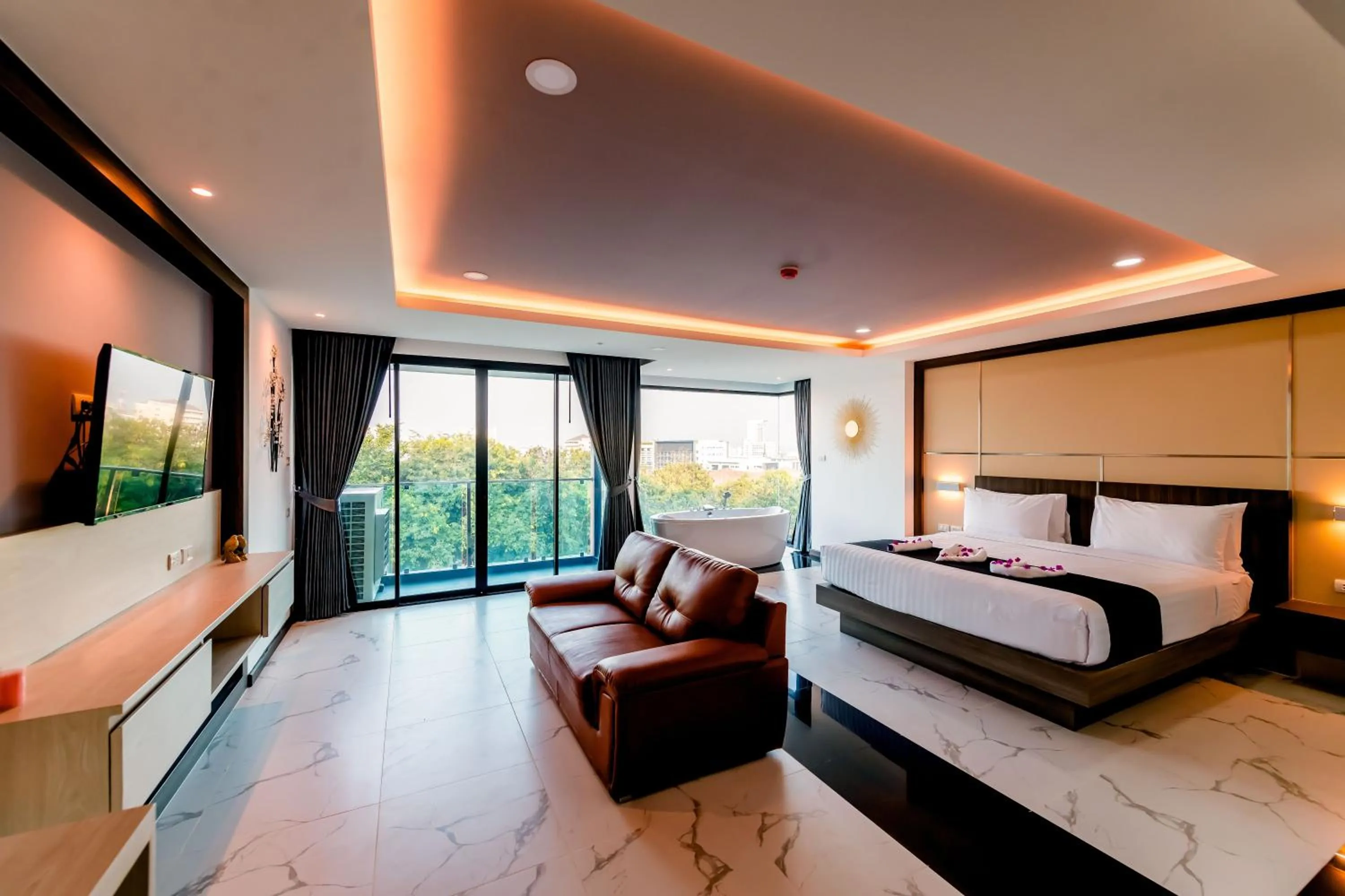 Bed in The Proud Hotel Pattaya - SHA Certified