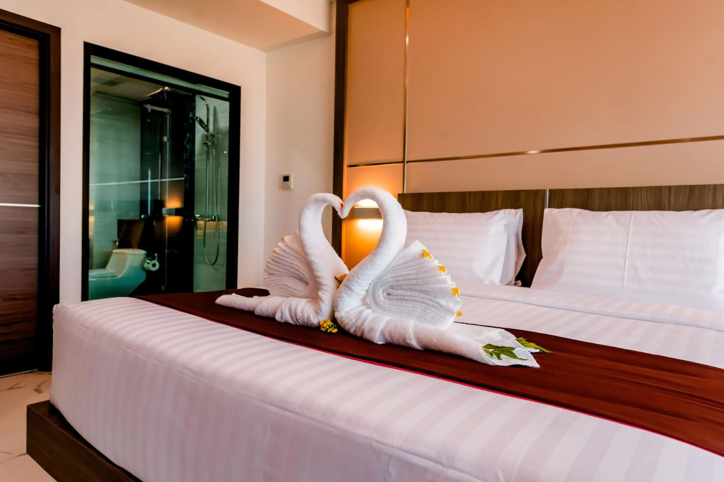 Bed in The Proud Hotel Pattaya - SHA Certified