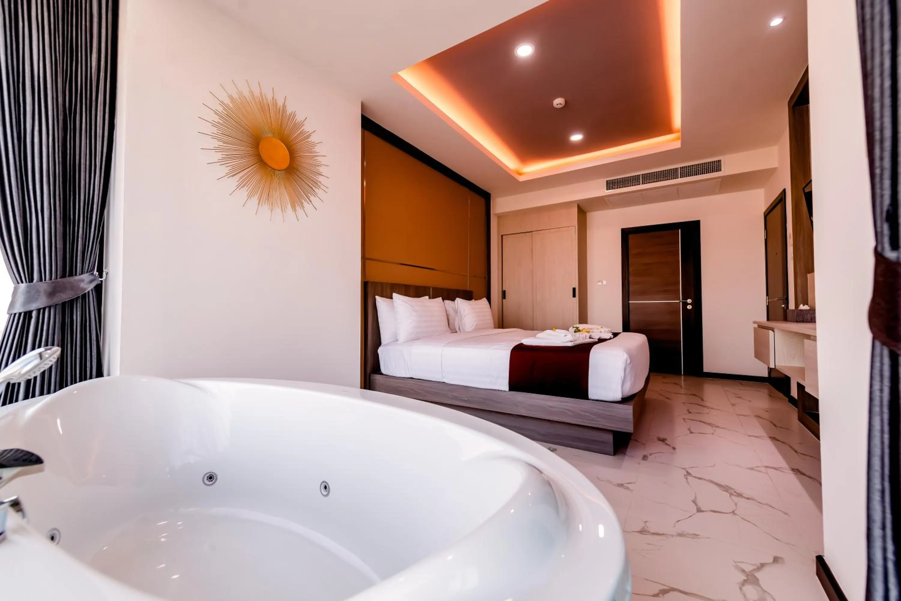 Bed in The Proud Hotel Pattaya - SHA Certified