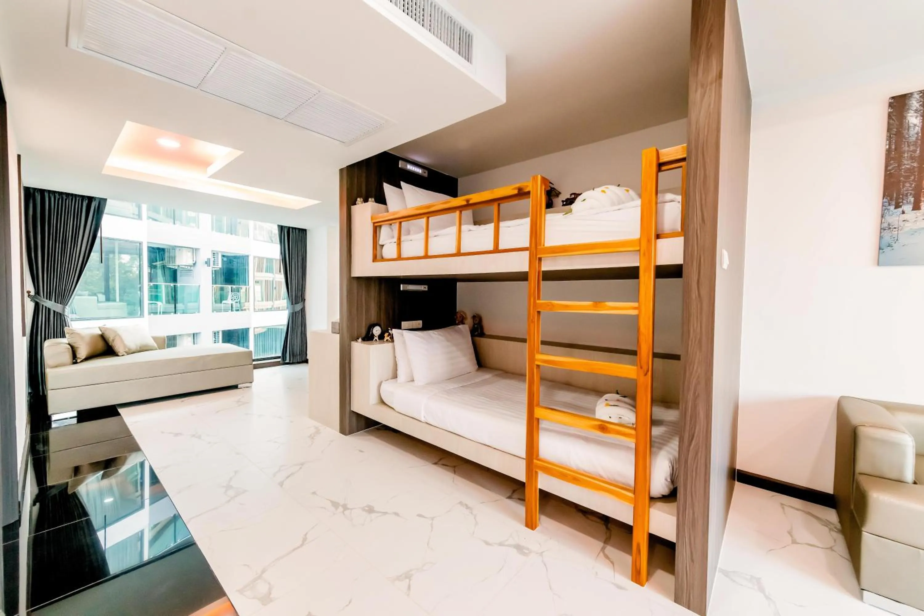 Bed in The Proud Hotel Pattaya - SHA Certified