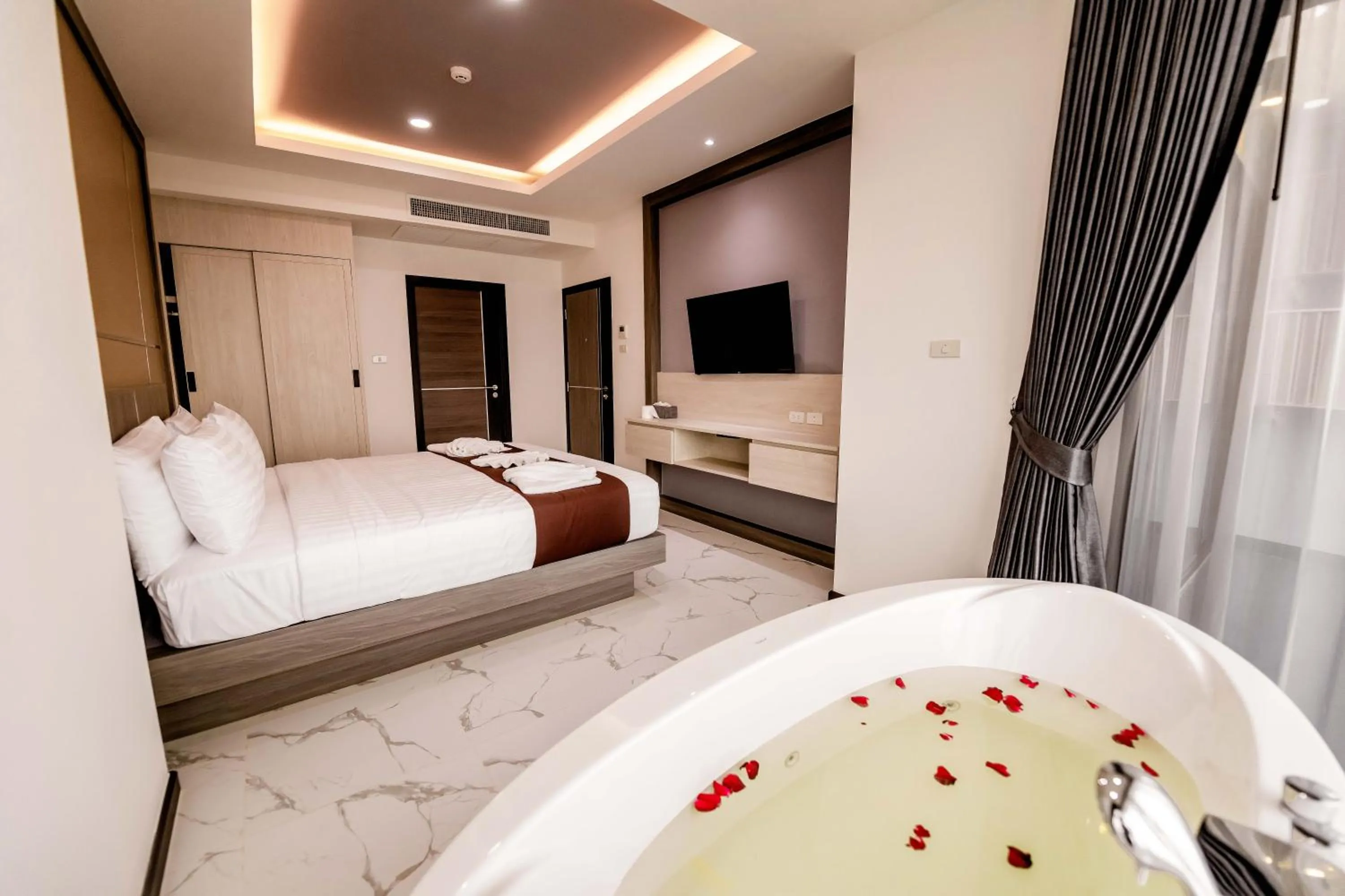 Bed in The Proud Hotel Pattaya - SHA Certified