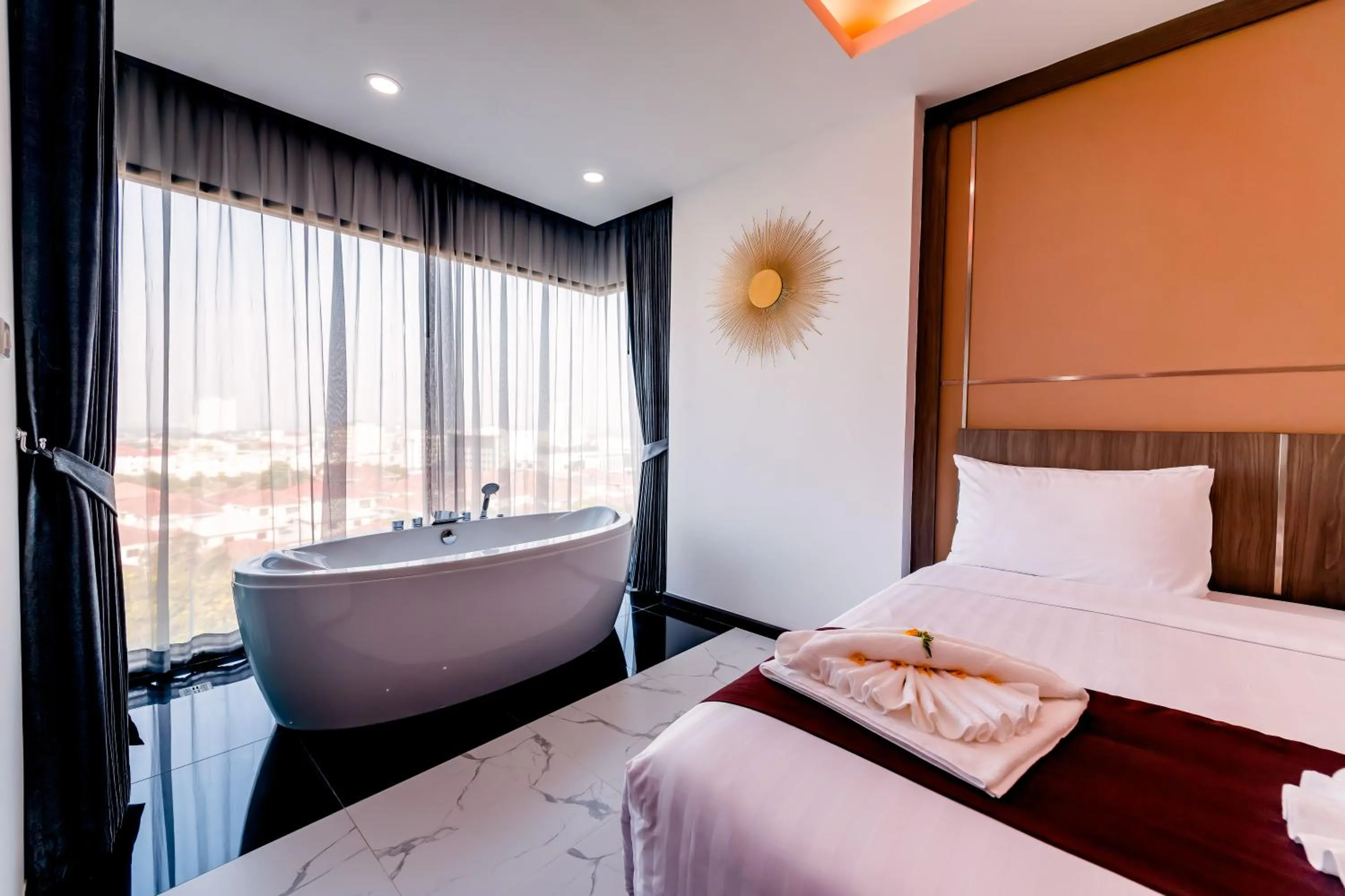 Bed in The Proud Hotel Pattaya - SHA Certified