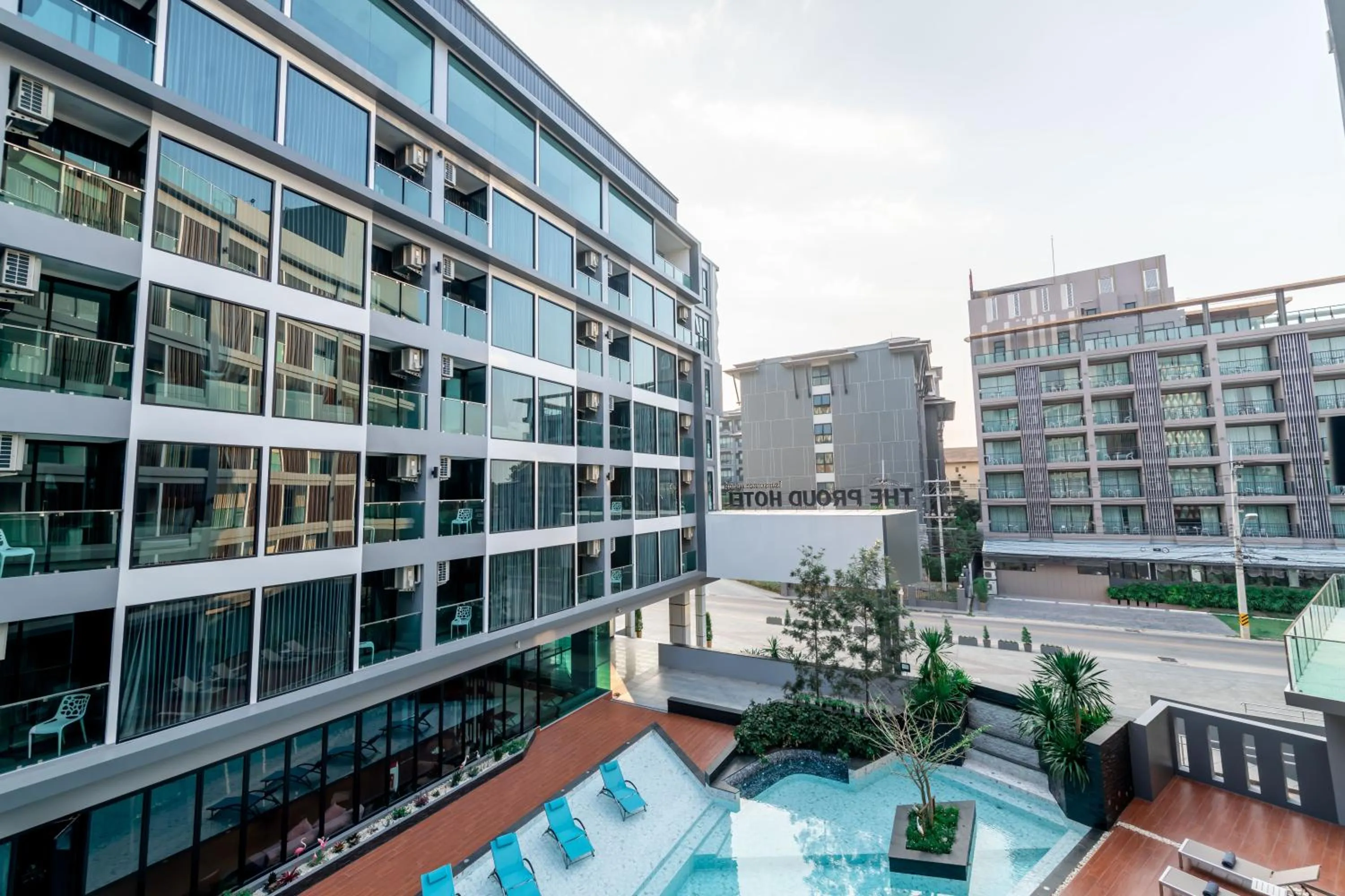 Swimming pool in The Proud Hotel Pattaya - SHA Certified