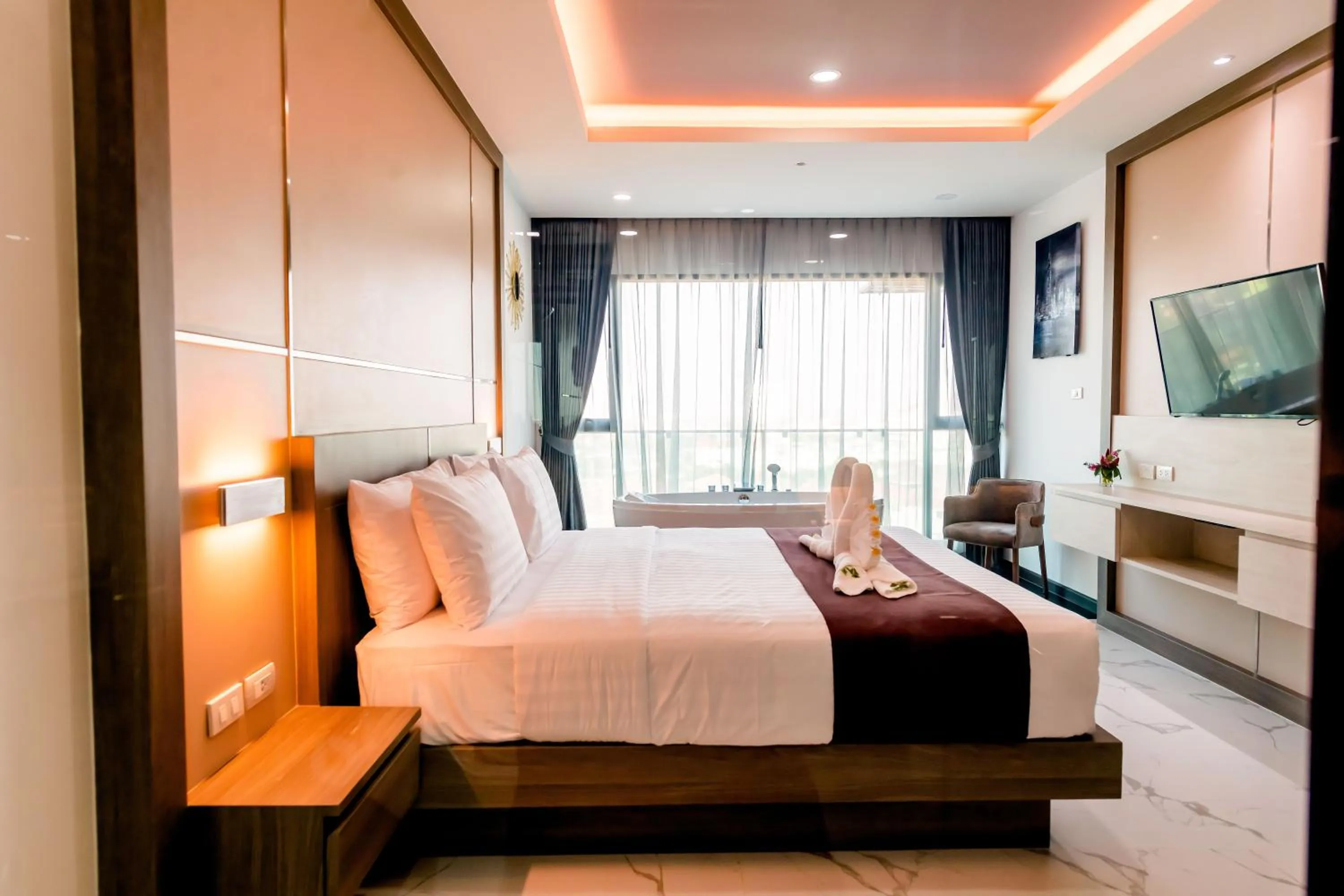 Bed in The Proud Hotel Pattaya - SHA Certified
