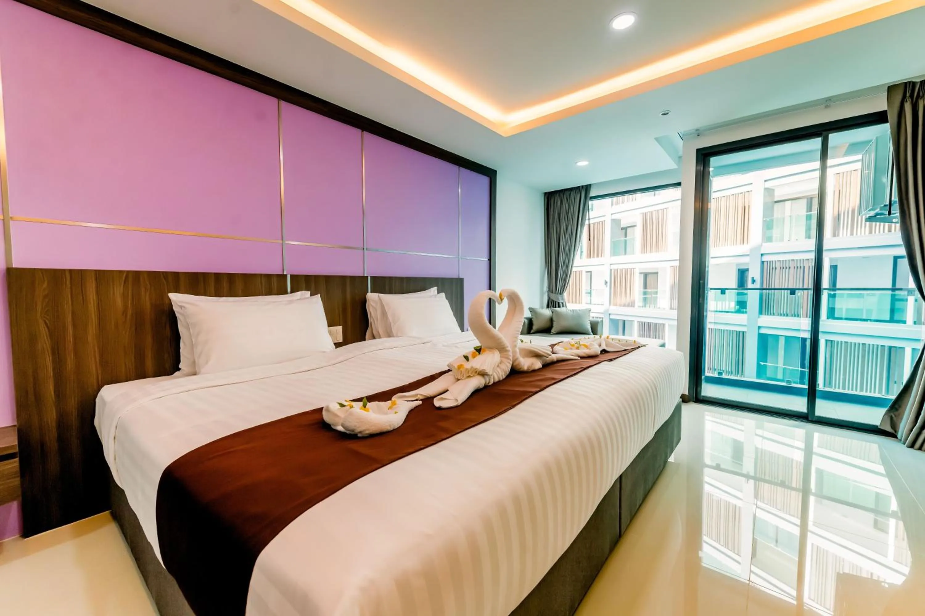 Bed in The Proud Hotel Pattaya - SHA Certified