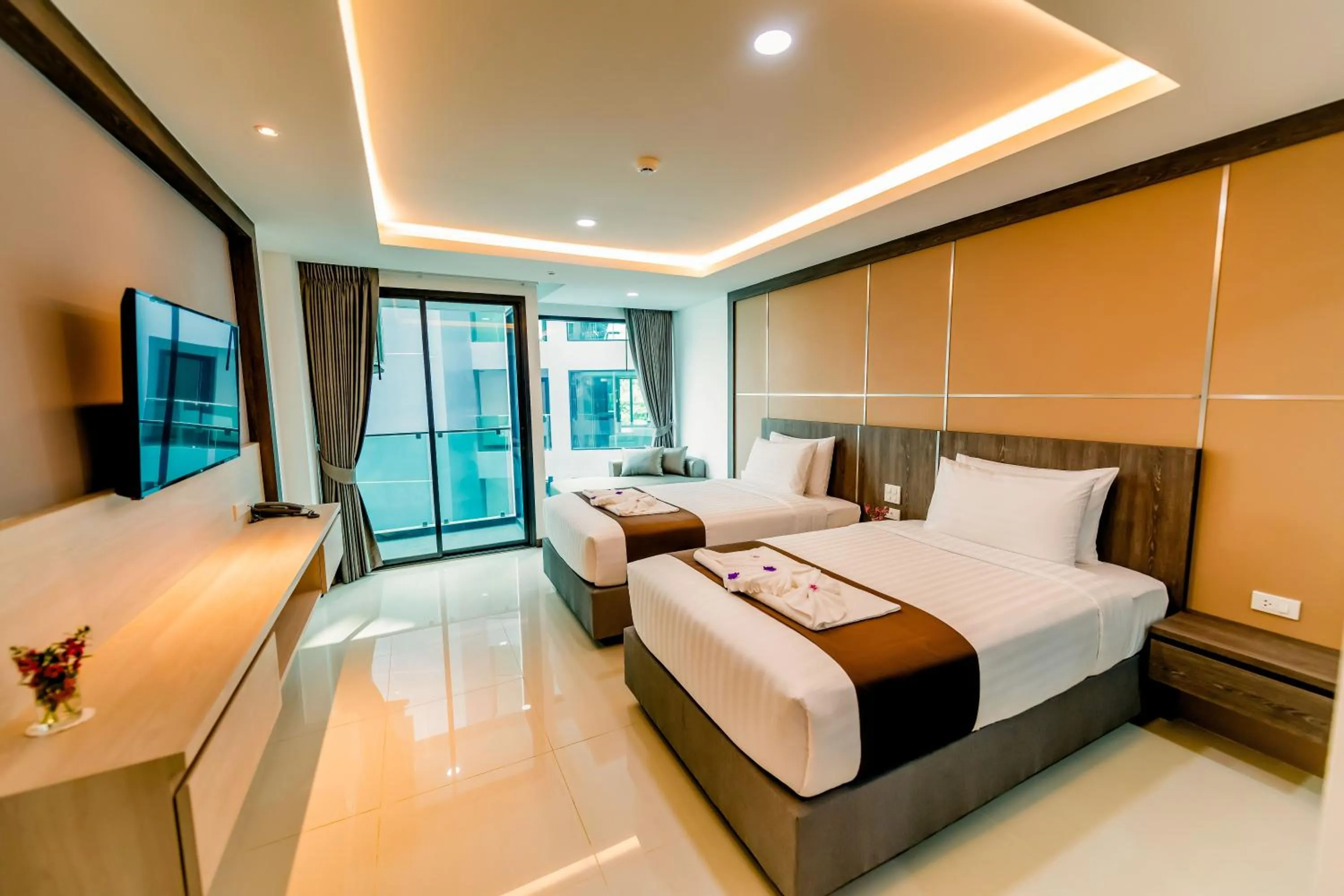Bed in The Proud Hotel Pattaya - SHA Certified