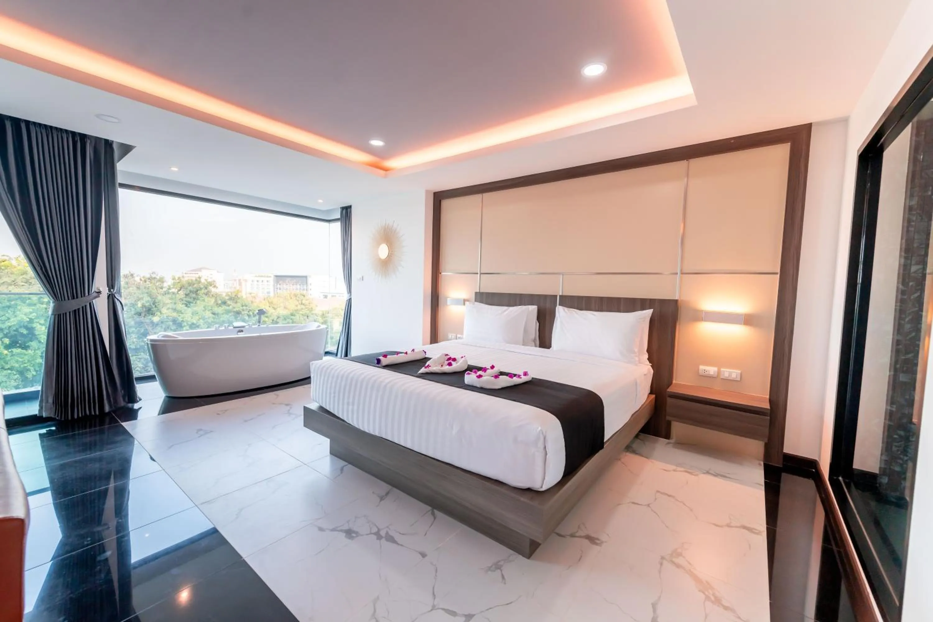 Bed in The Proud Hotel Pattaya - SHA Certified