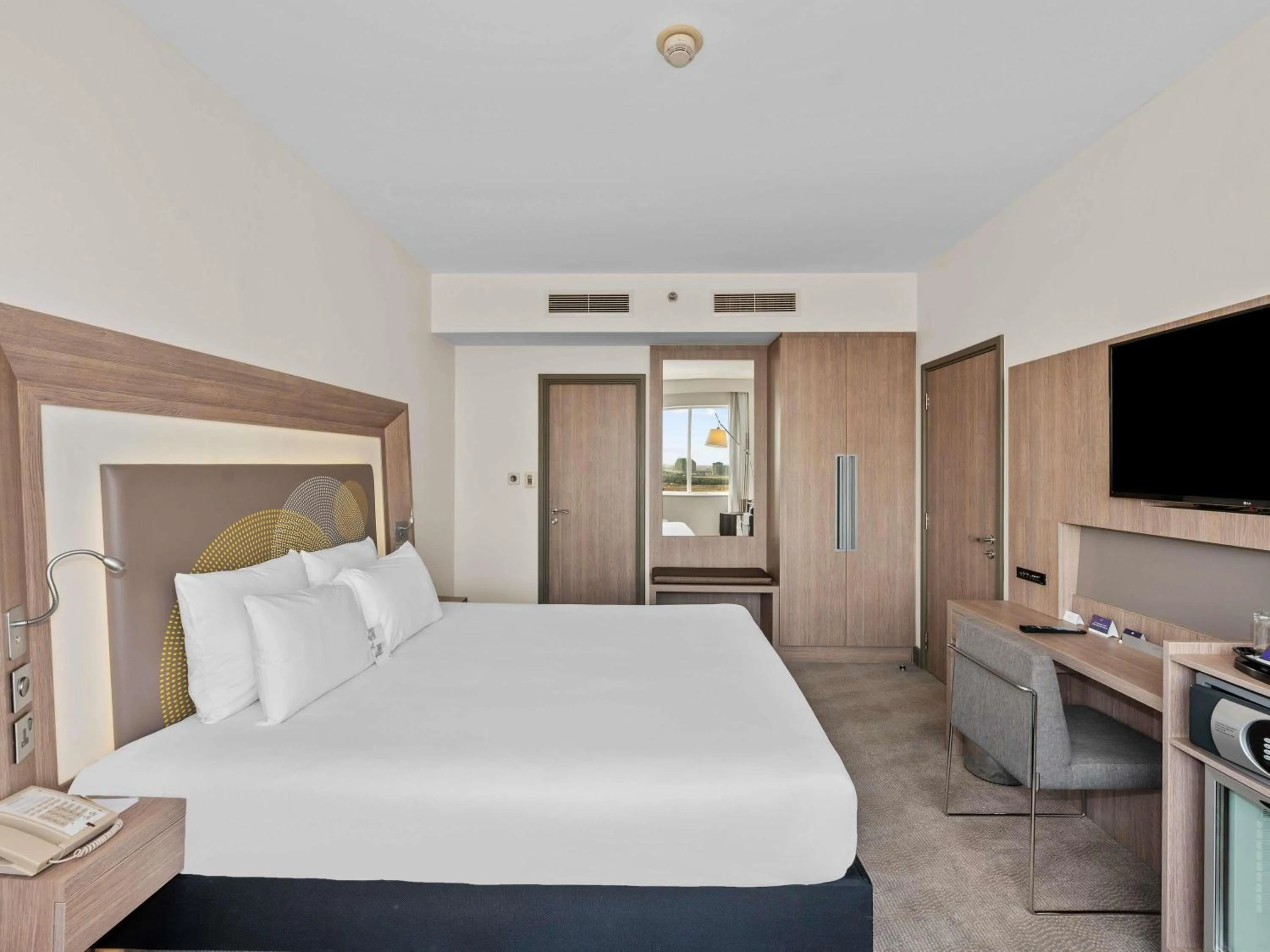 Photo of the whole room, Bed in Novotel Dubai World Trade Centre