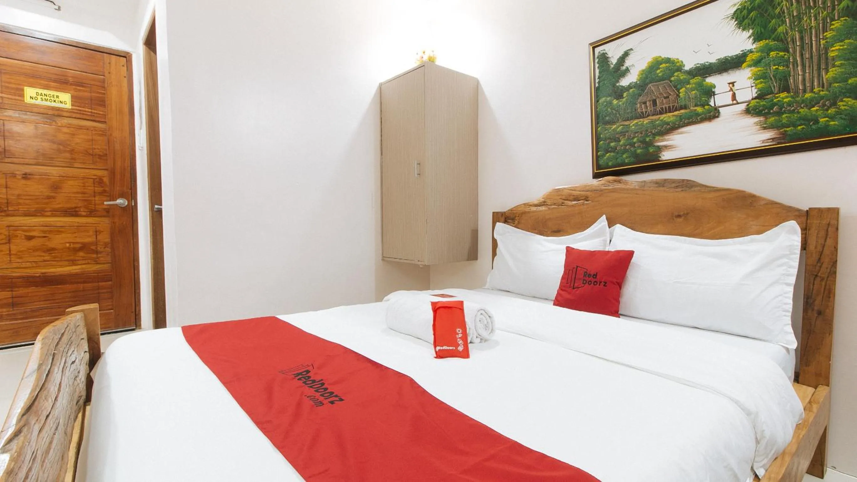 Photo of the whole room, Bed in RedDoorz Plus @ Jollydays Hotel Nueva Ecija