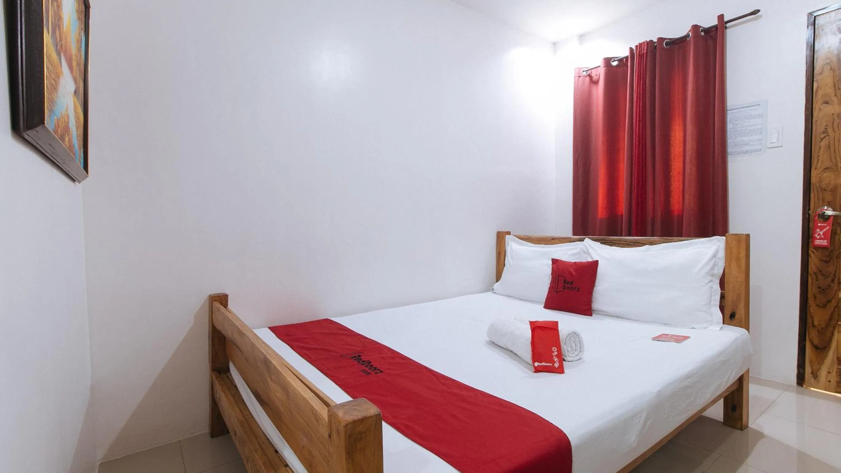 Photo of the whole room, Bed in RedDoorz Plus @ Jollydays Hotel Nueva Ecija