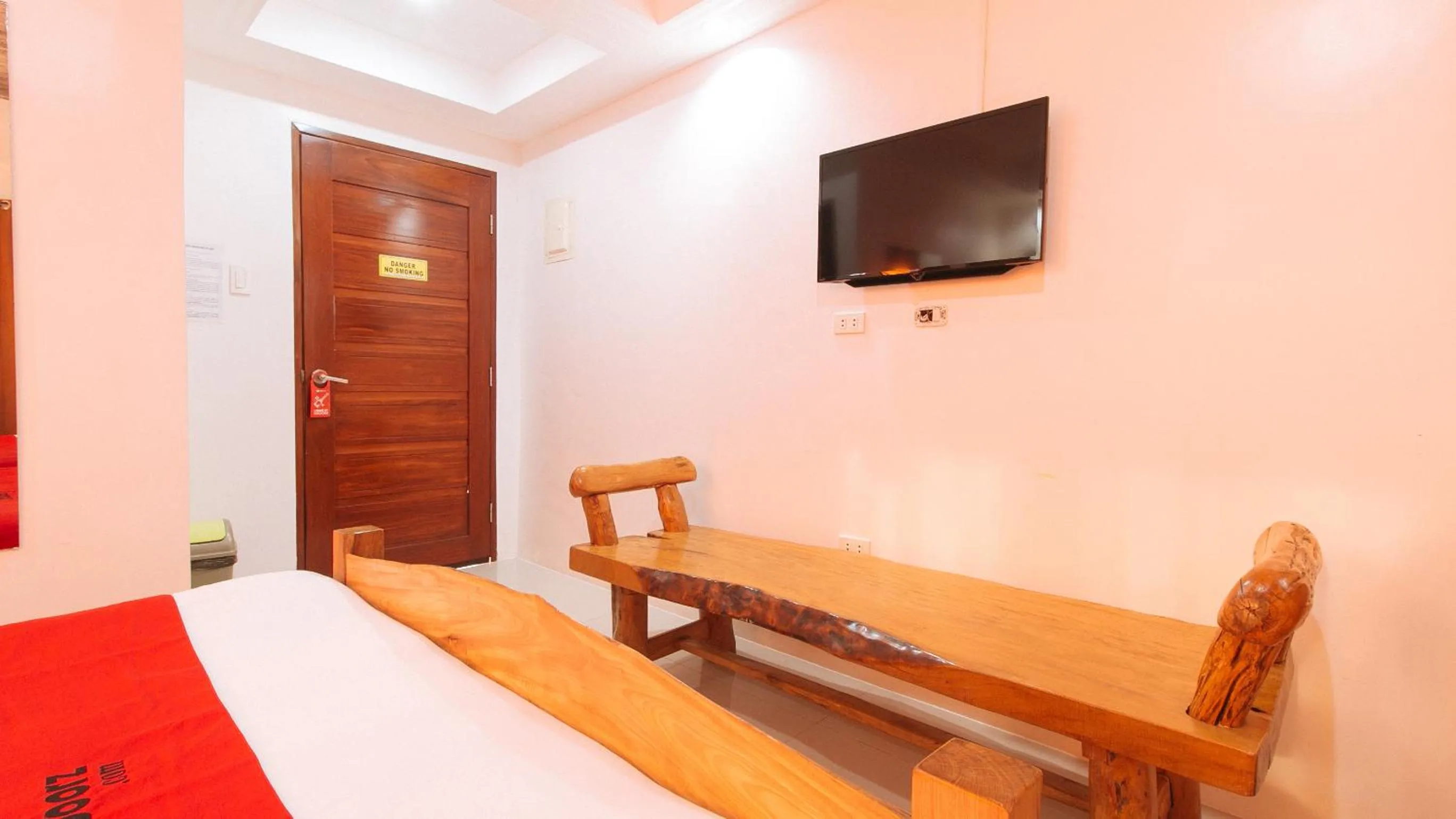 Photo of the whole room, Bed in RedDoorz Plus @ Jollydays Hotel Nueva Ecija