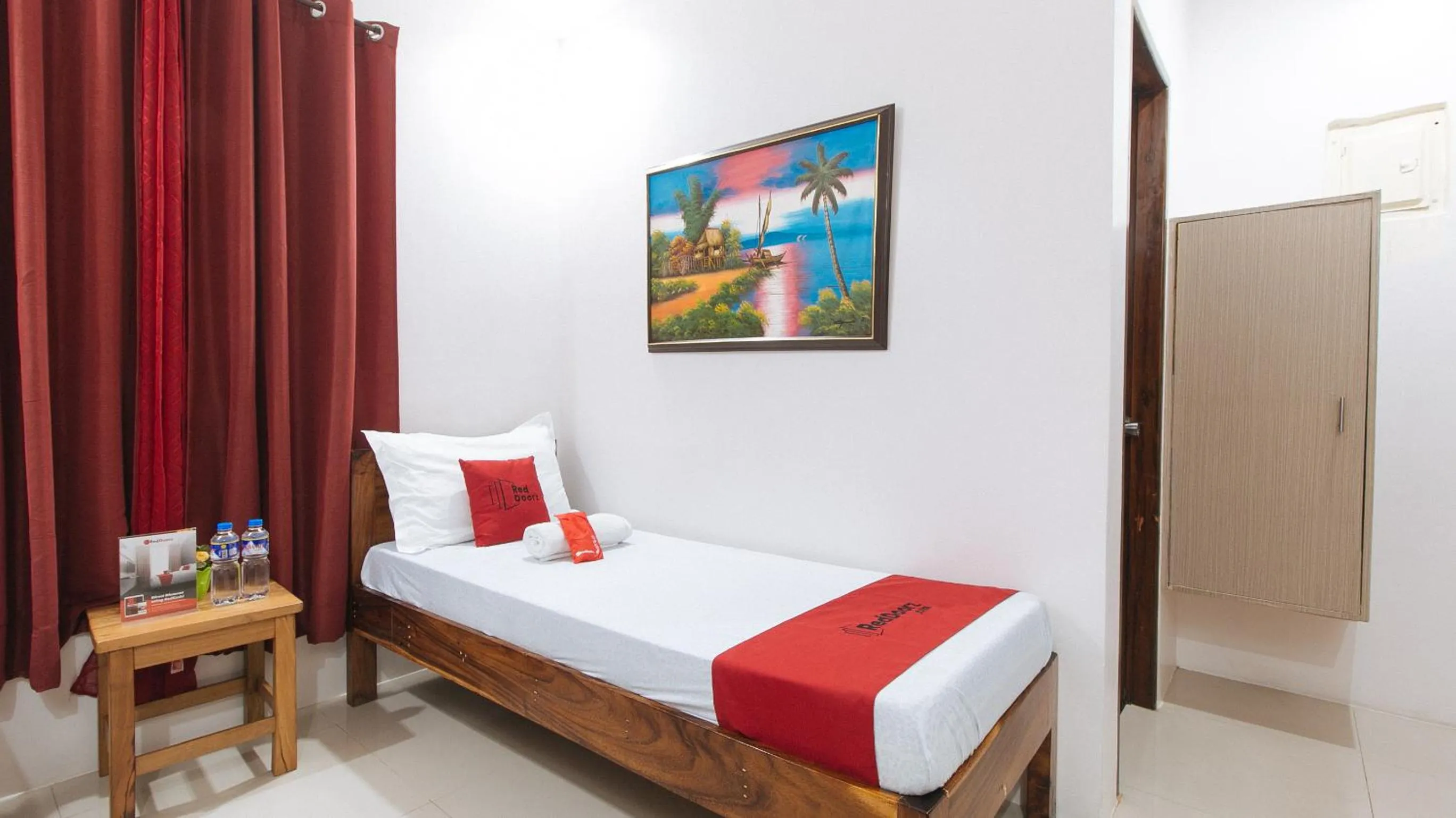 Photo of the whole room, Bed in RedDoorz Plus @ Jollydays Hotel Nueva Ecija