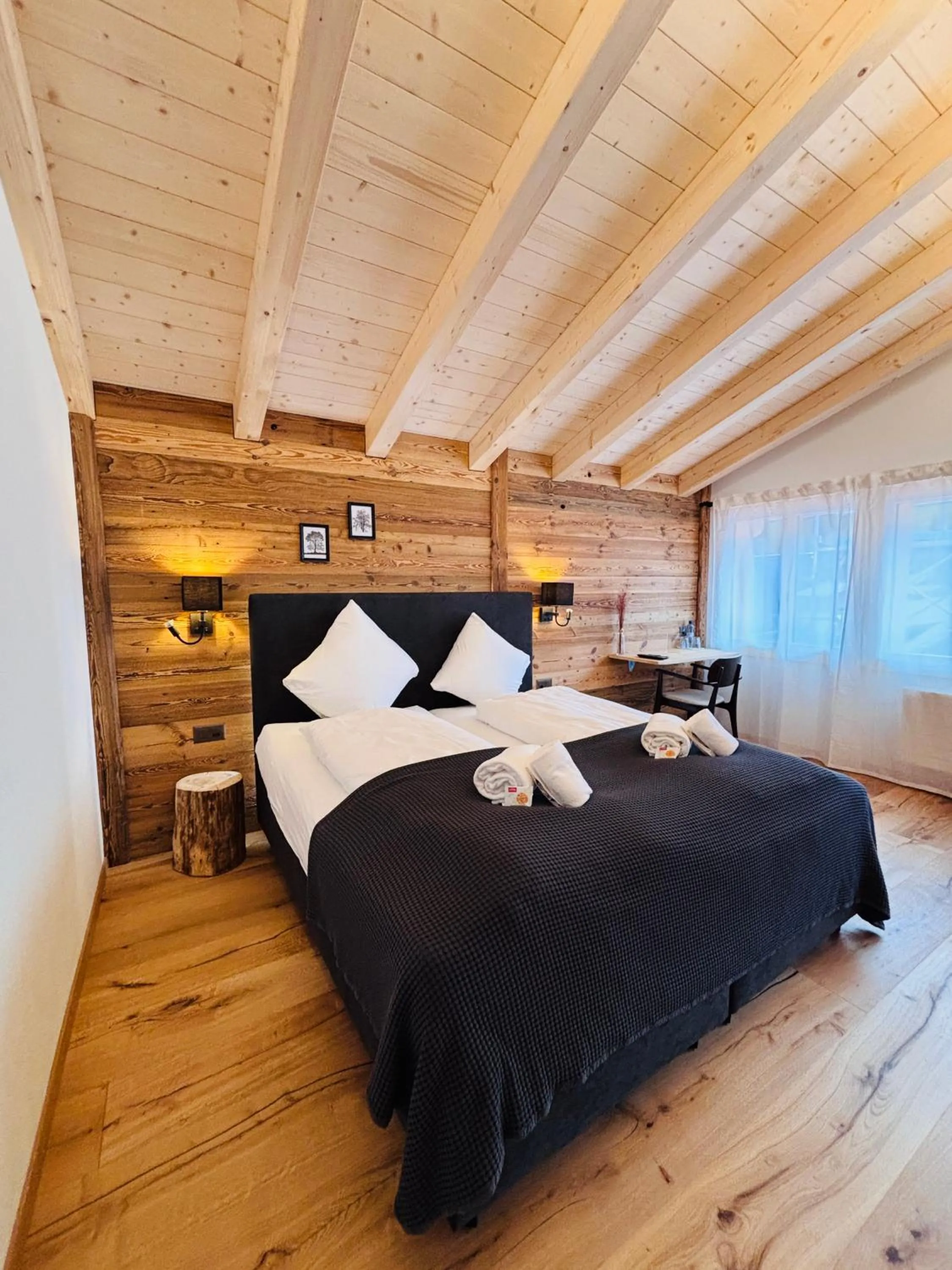 Bed in Typically Swiss Hotel Ermitage