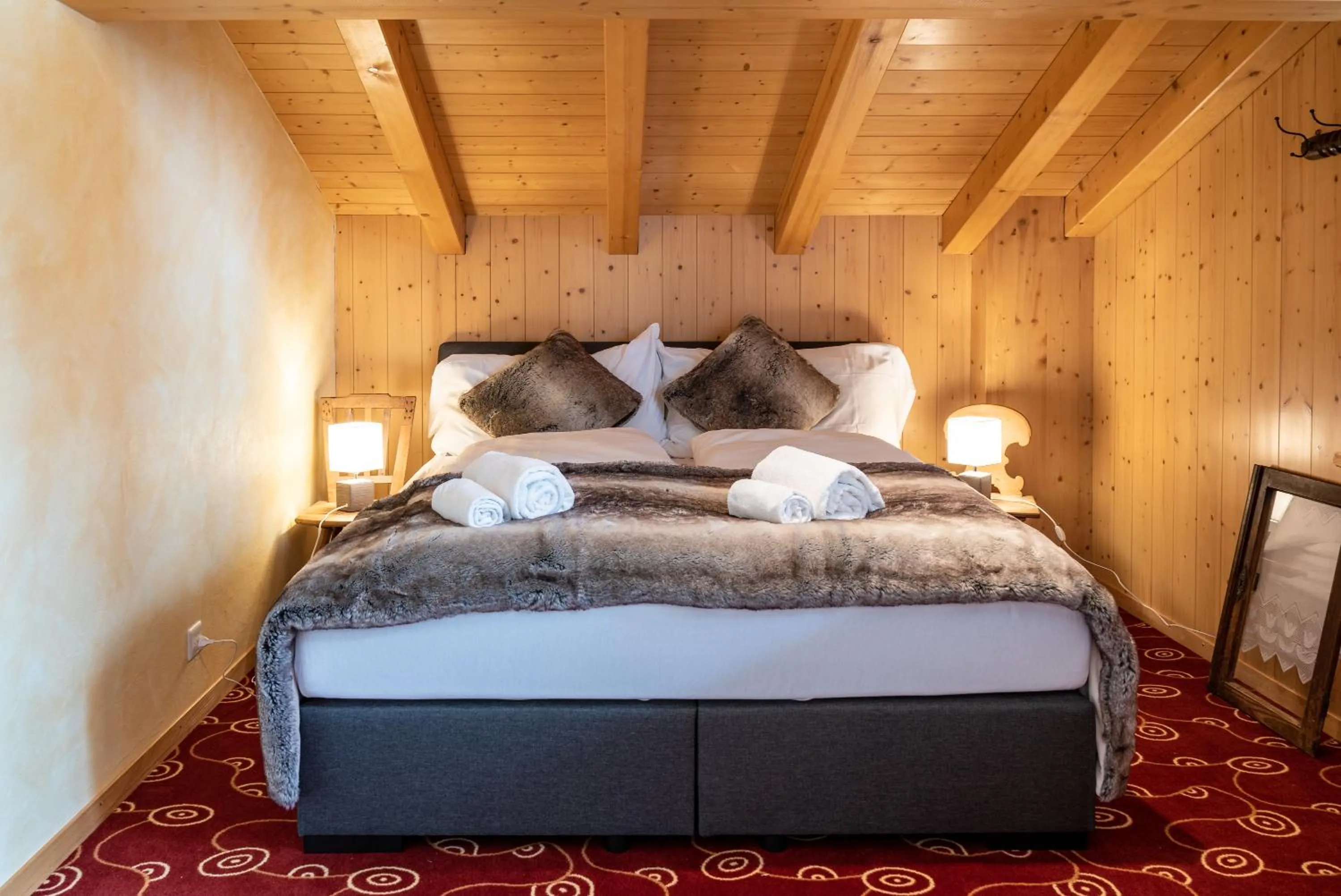 Bed in Typically Swiss Hotel Ermitage