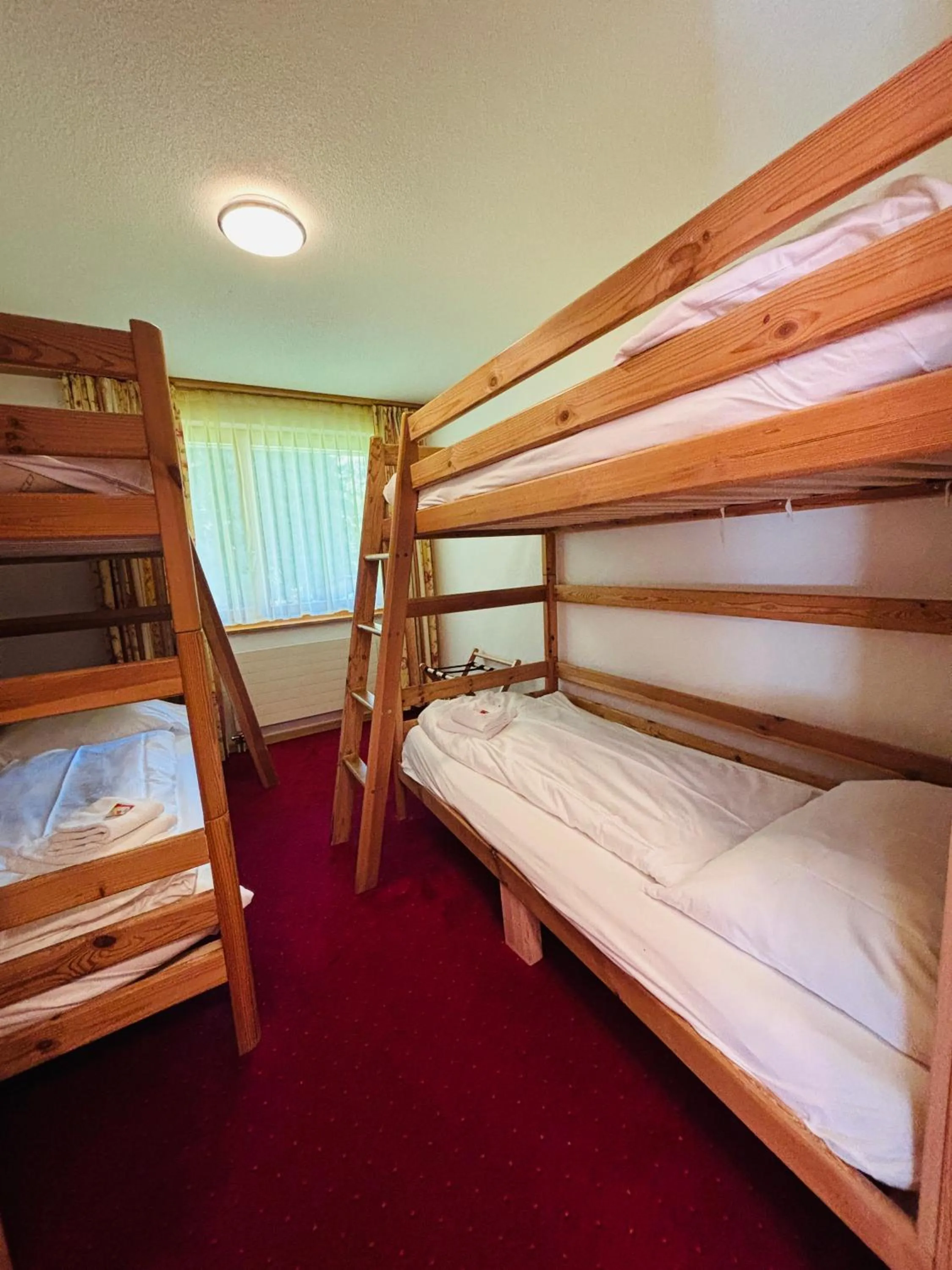 Bed in Typically Swiss Hotel Ermitage